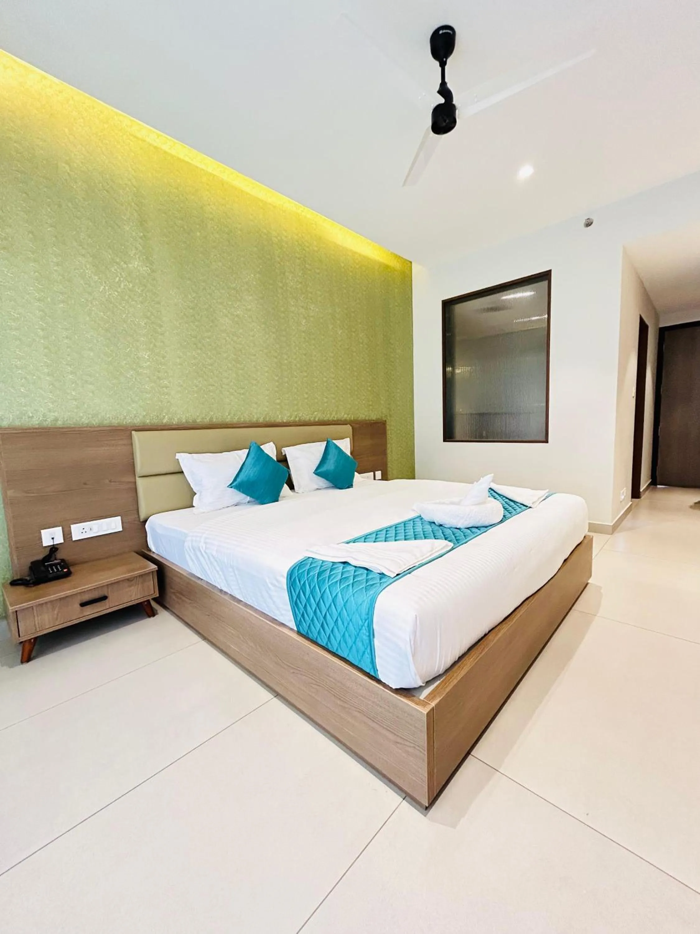 Bed in VAGA NAKSHATHRA SUITES