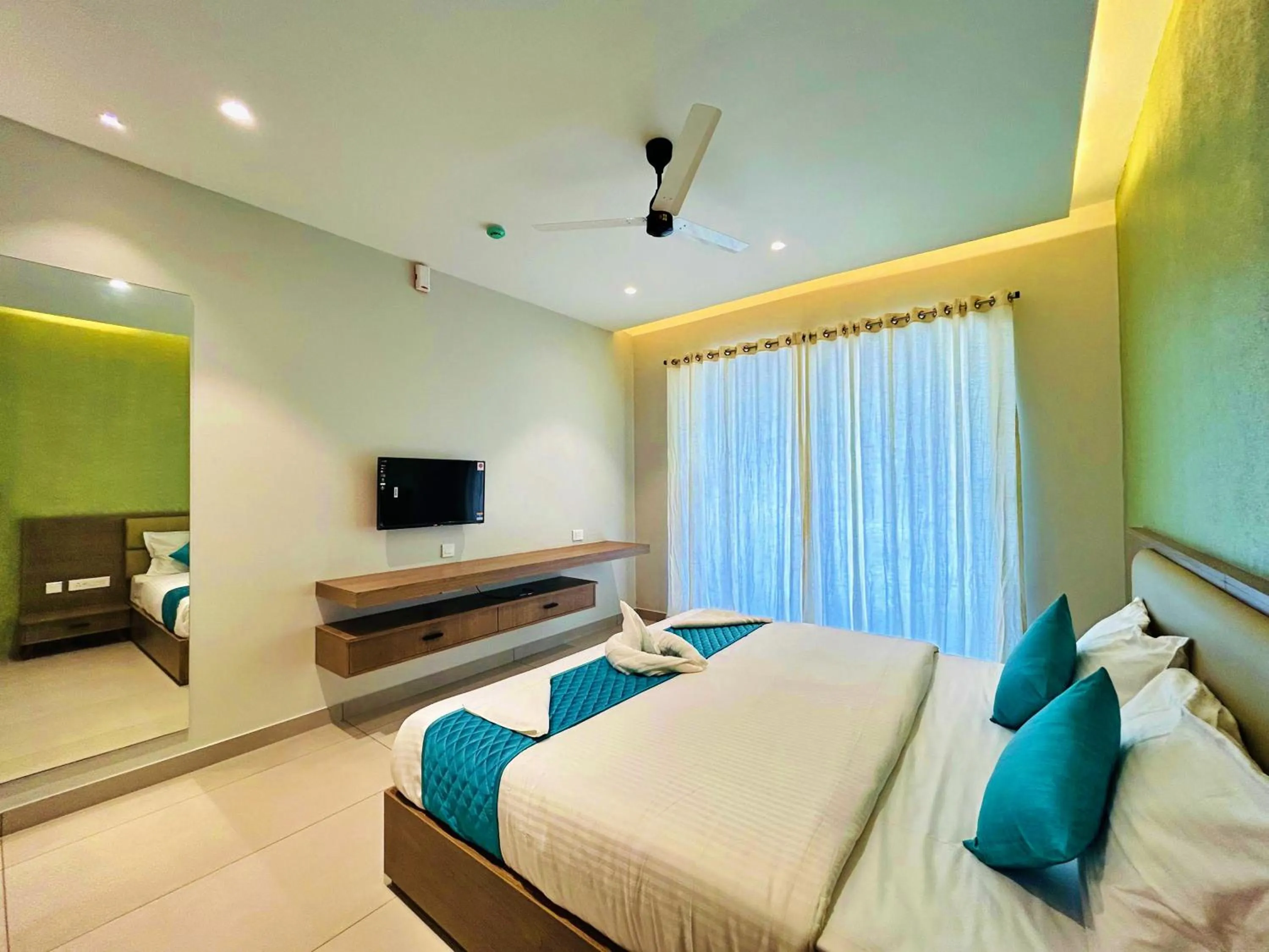 Bed in VAGA NAKSHATHRA SUITES