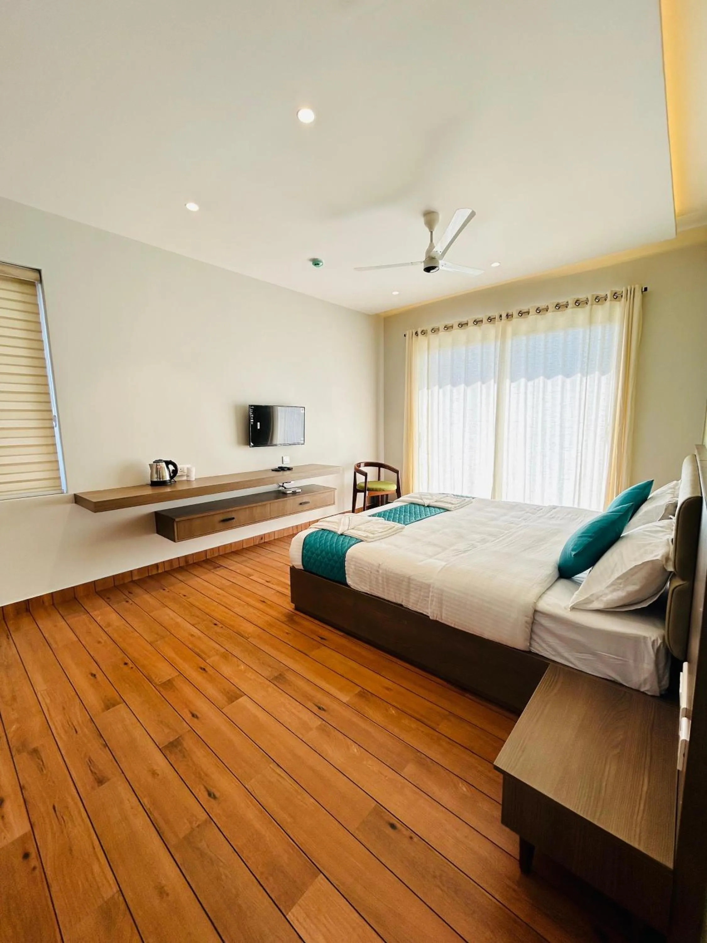Bed in VAGA NAKSHATHRA SUITES