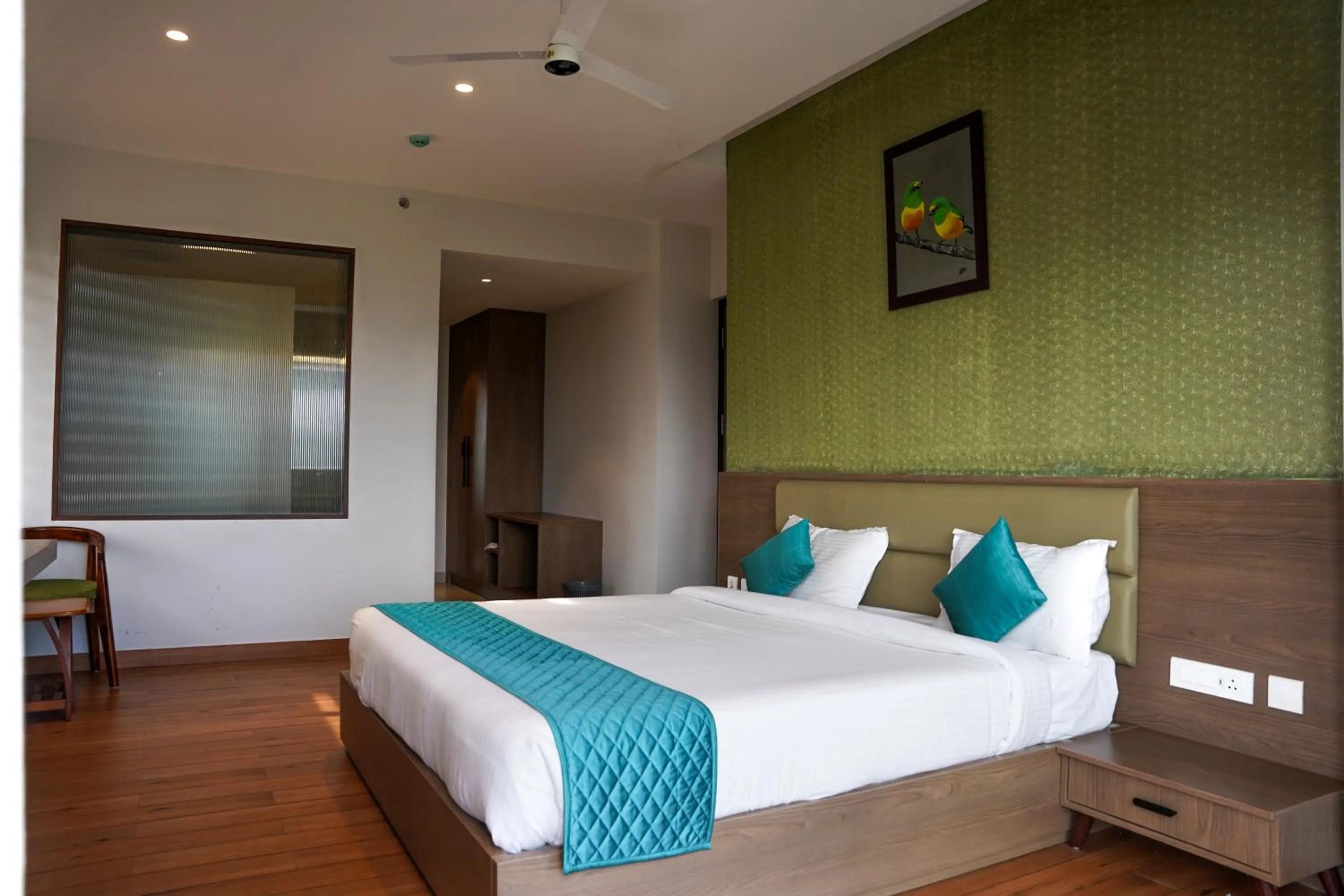Bed in VAGA NAKSHATHRA SUITES