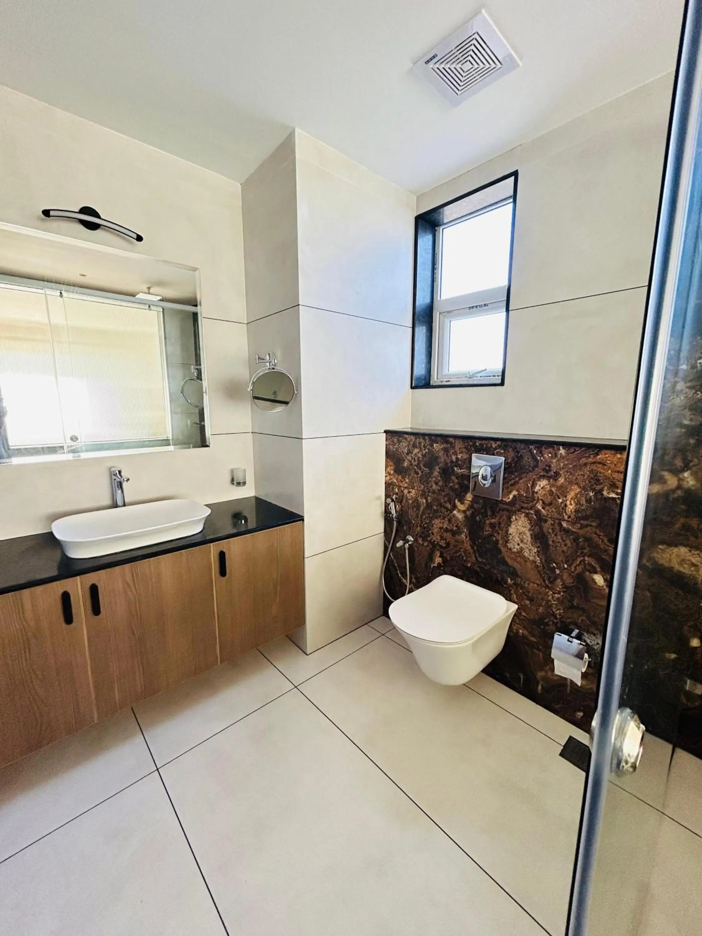 Shower in VAGA NAKSHATHRA SUITES