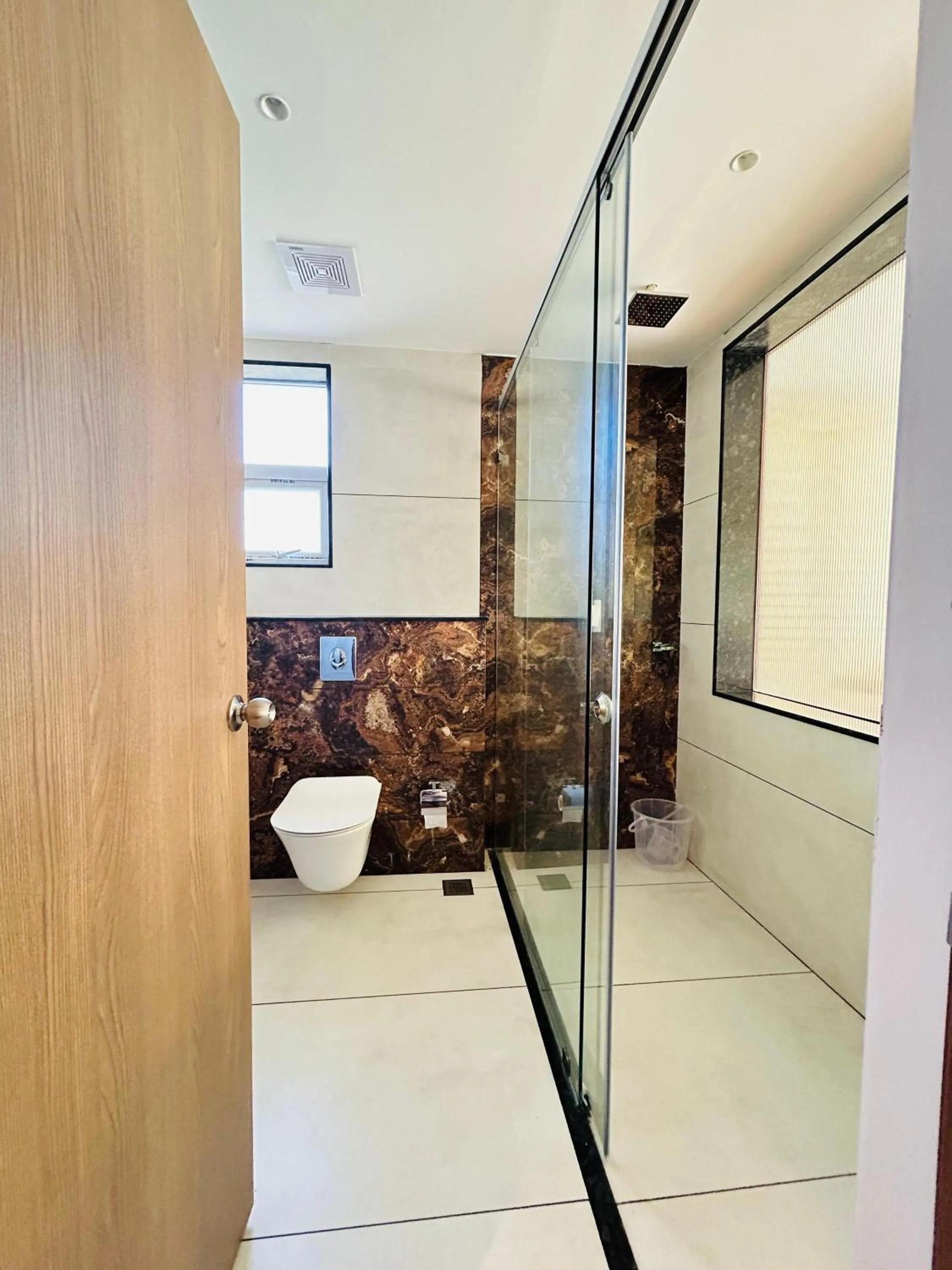 Shower in VAGA NAKSHATHRA SUITES