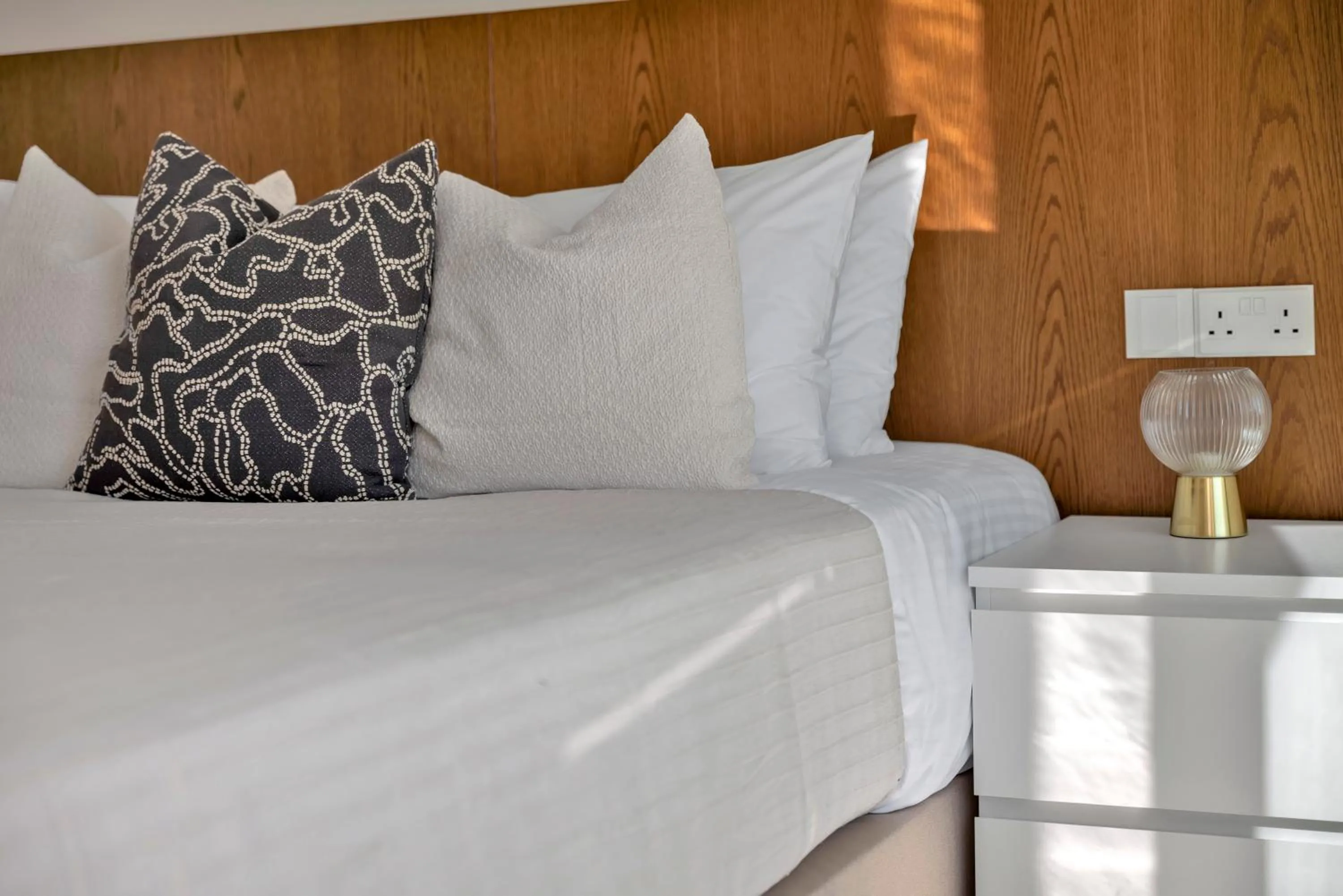 Bed in Phaedrus Living Alkminis Seaview Suites Pantai