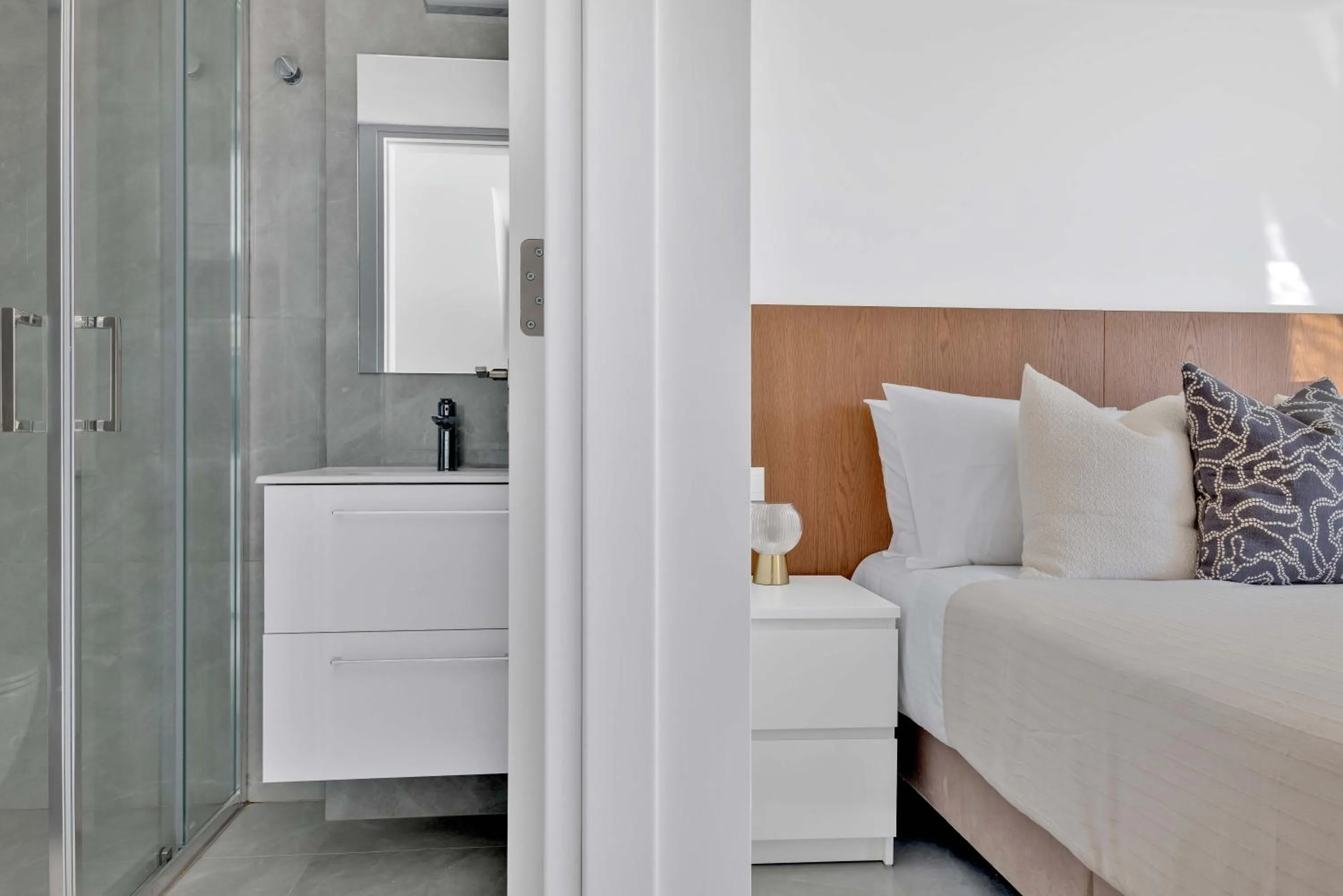 Bed in Phaedrus Living Alkminis Seaview Suites Pantai