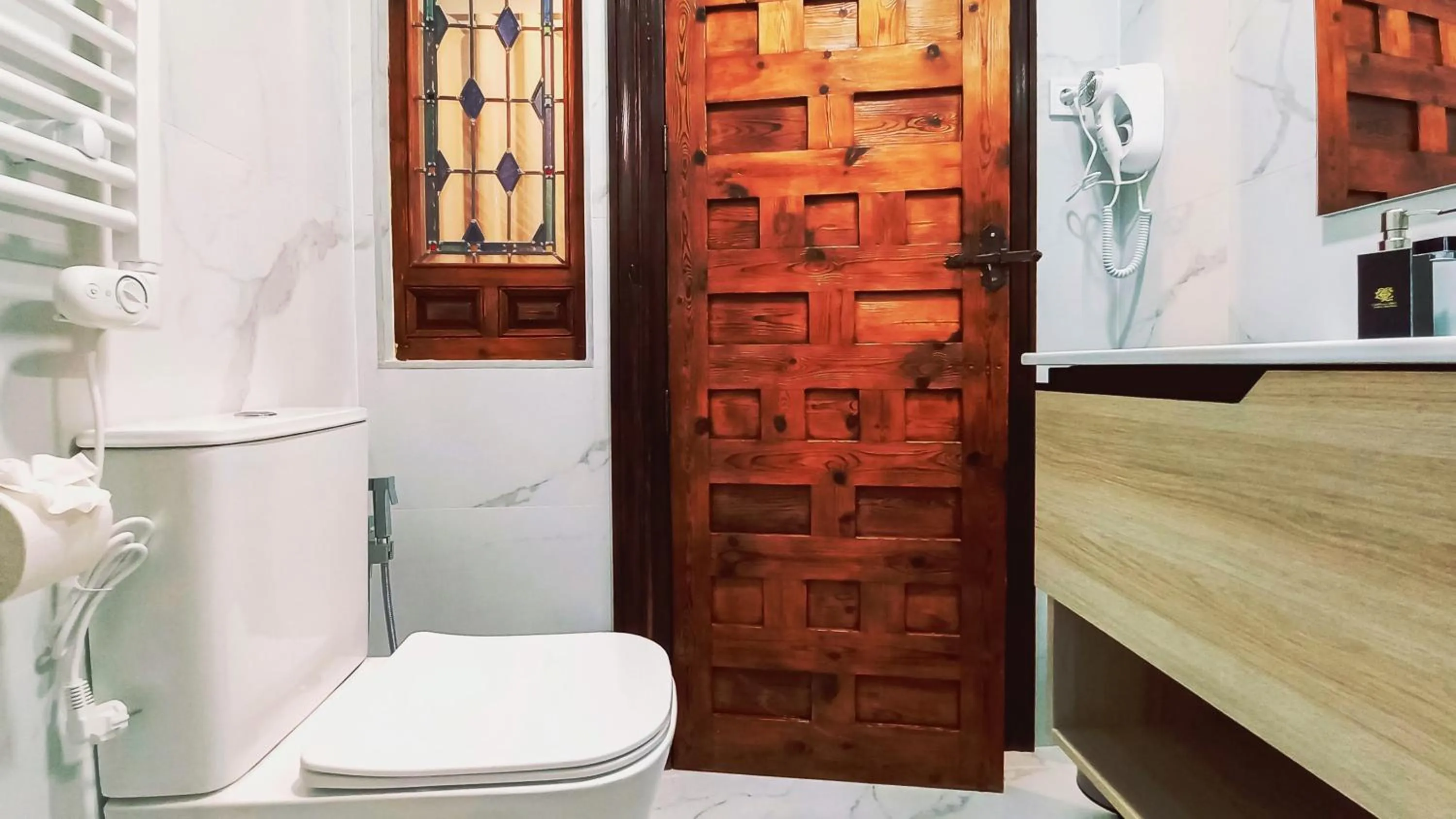 Toilet in Casón De Los López Apartments