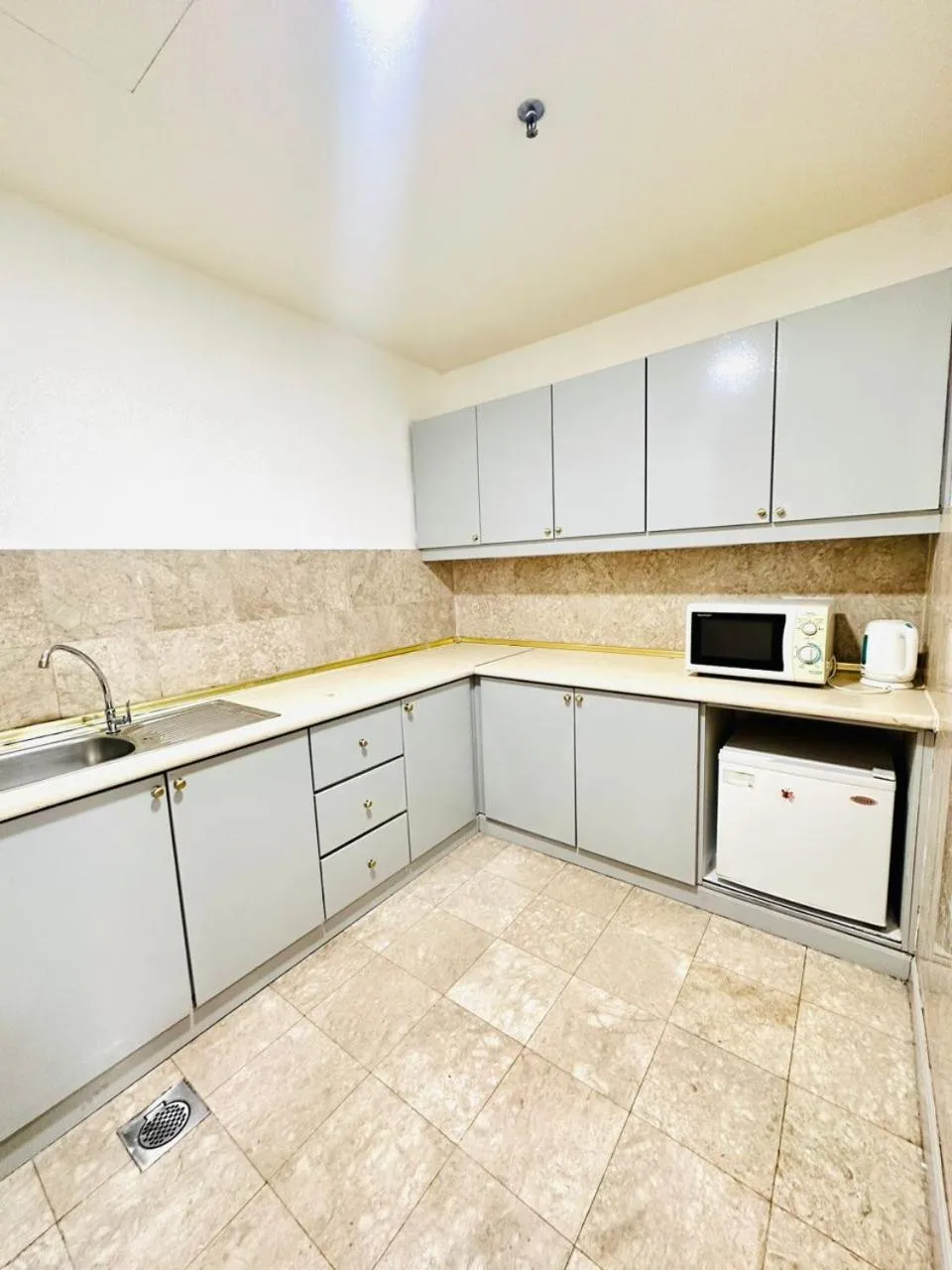 Kitchen or kitchenette in KL COZY GOLD SUITE At TIMES SQUARE