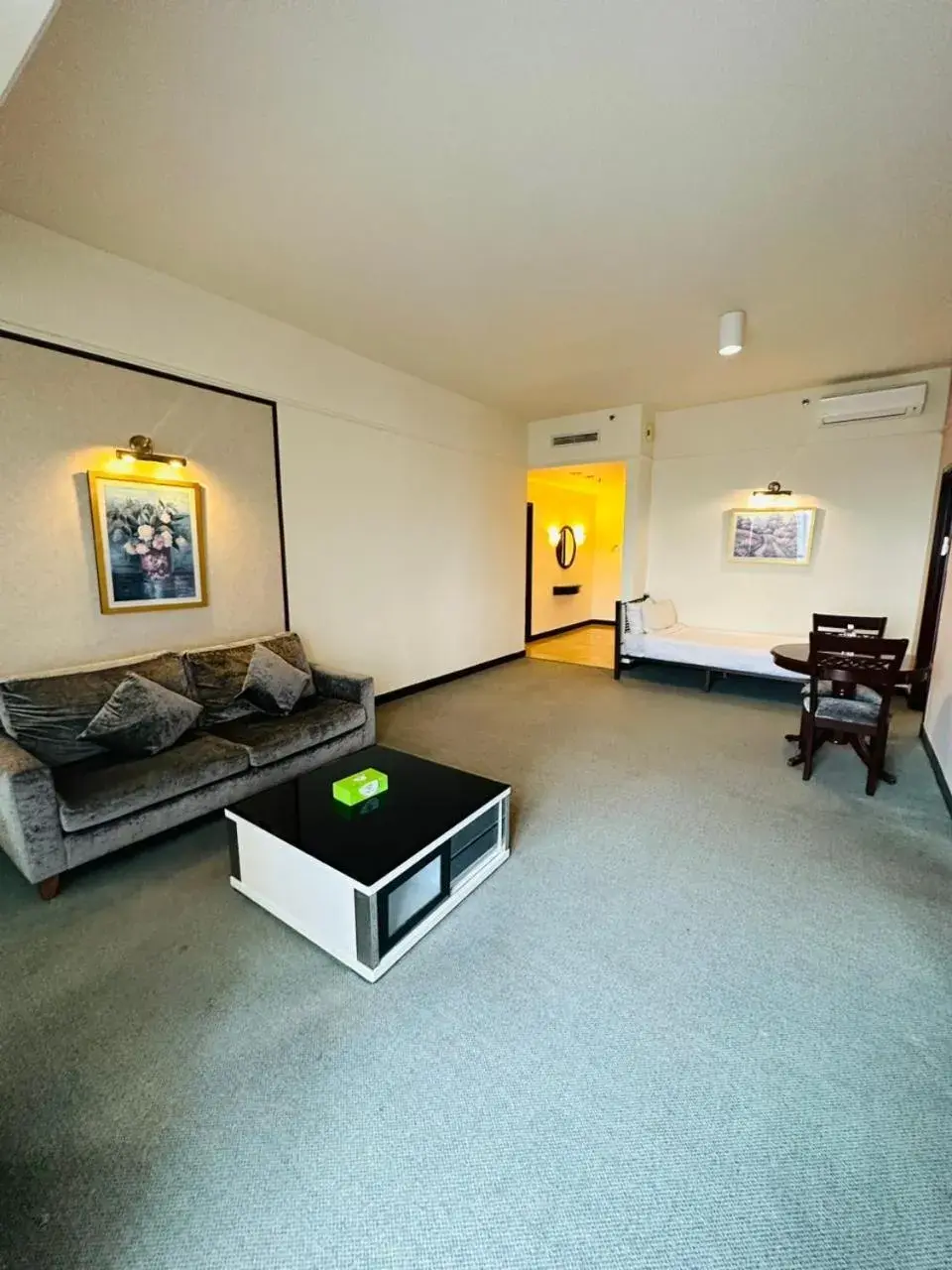 Living room in KL COZY GOLD SUITE At TIMES SQUARE Living room in KL COZY GOLD SUITE At TIMES SQUARE