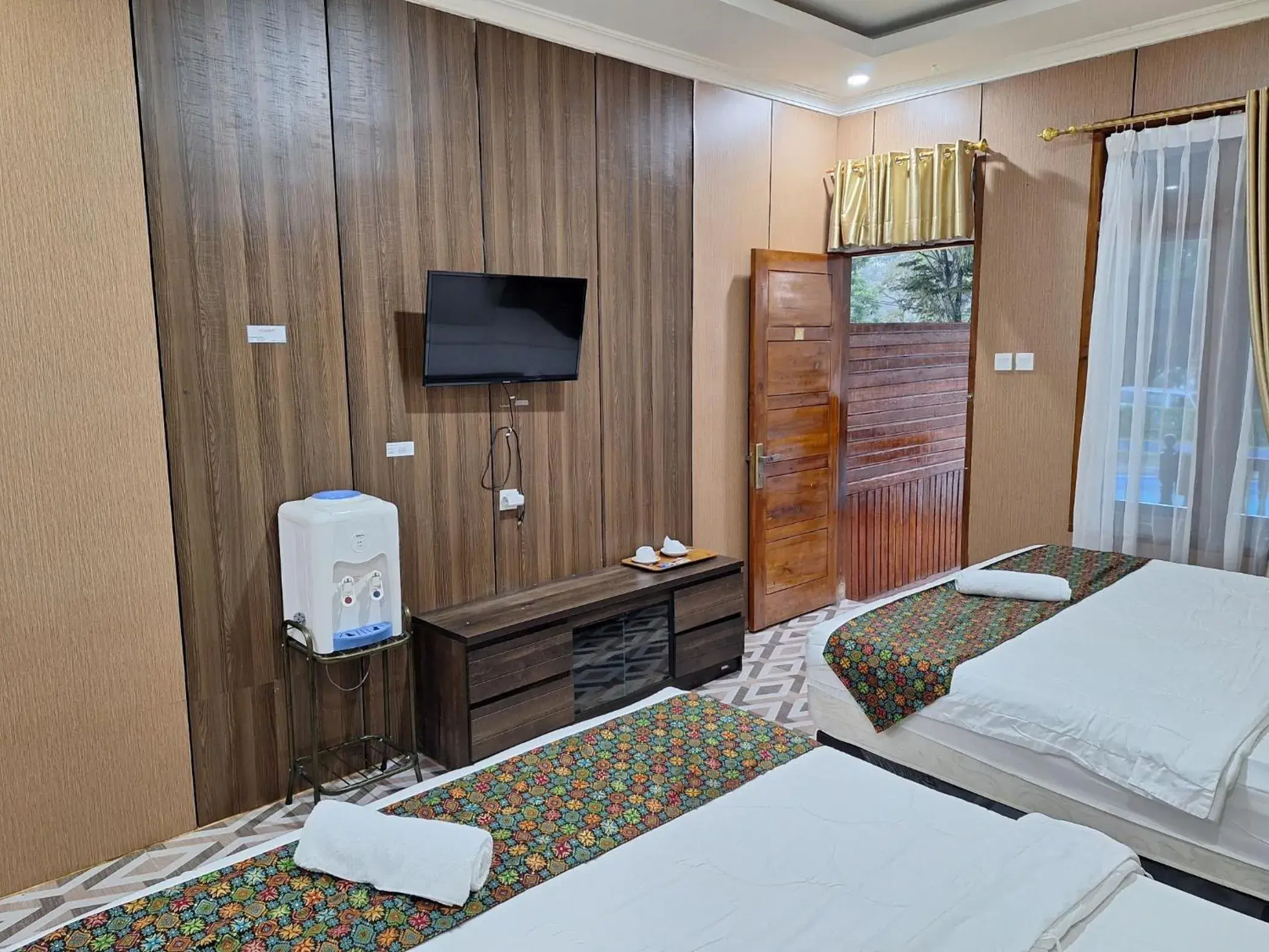 TV and multimedia, Bed in Mifan Resort And Waterpark TV and multimedia, Bed in Mifan Resort And Waterpark