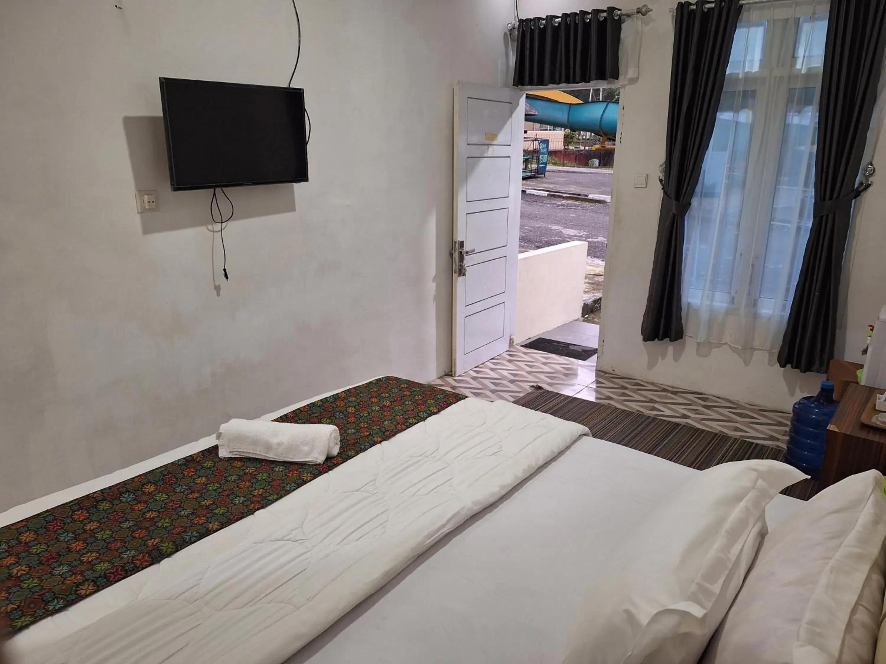 TV and multimedia, Bed in Mifan Resort And Waterpark TV and multimedia, Bed in Mifan Resort And Waterpark
