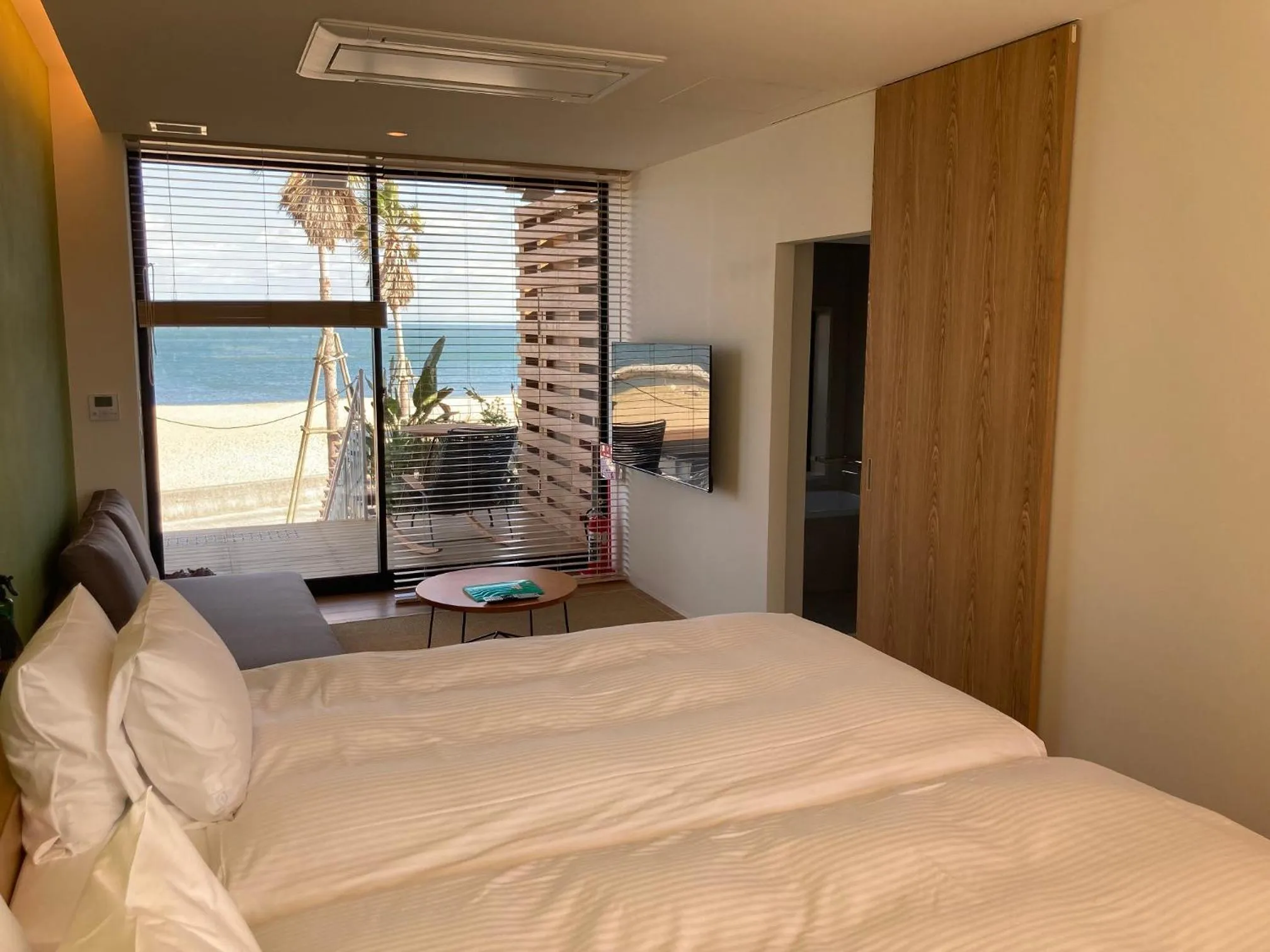 Bed in そらすな Beach Side Resort Hotel