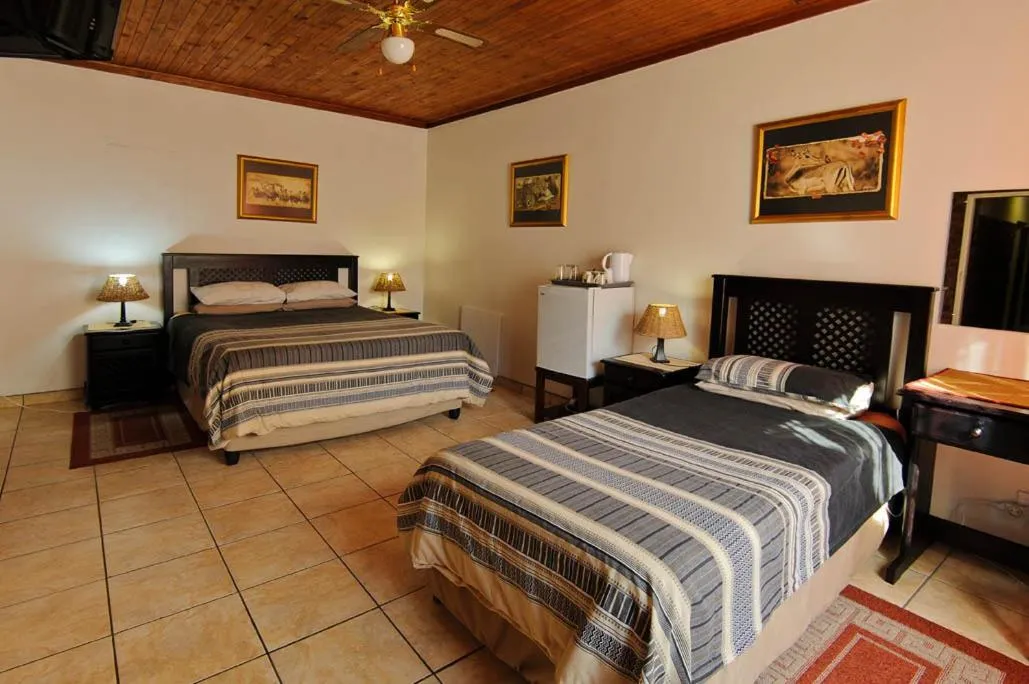 Bed in Mall Guesthouse