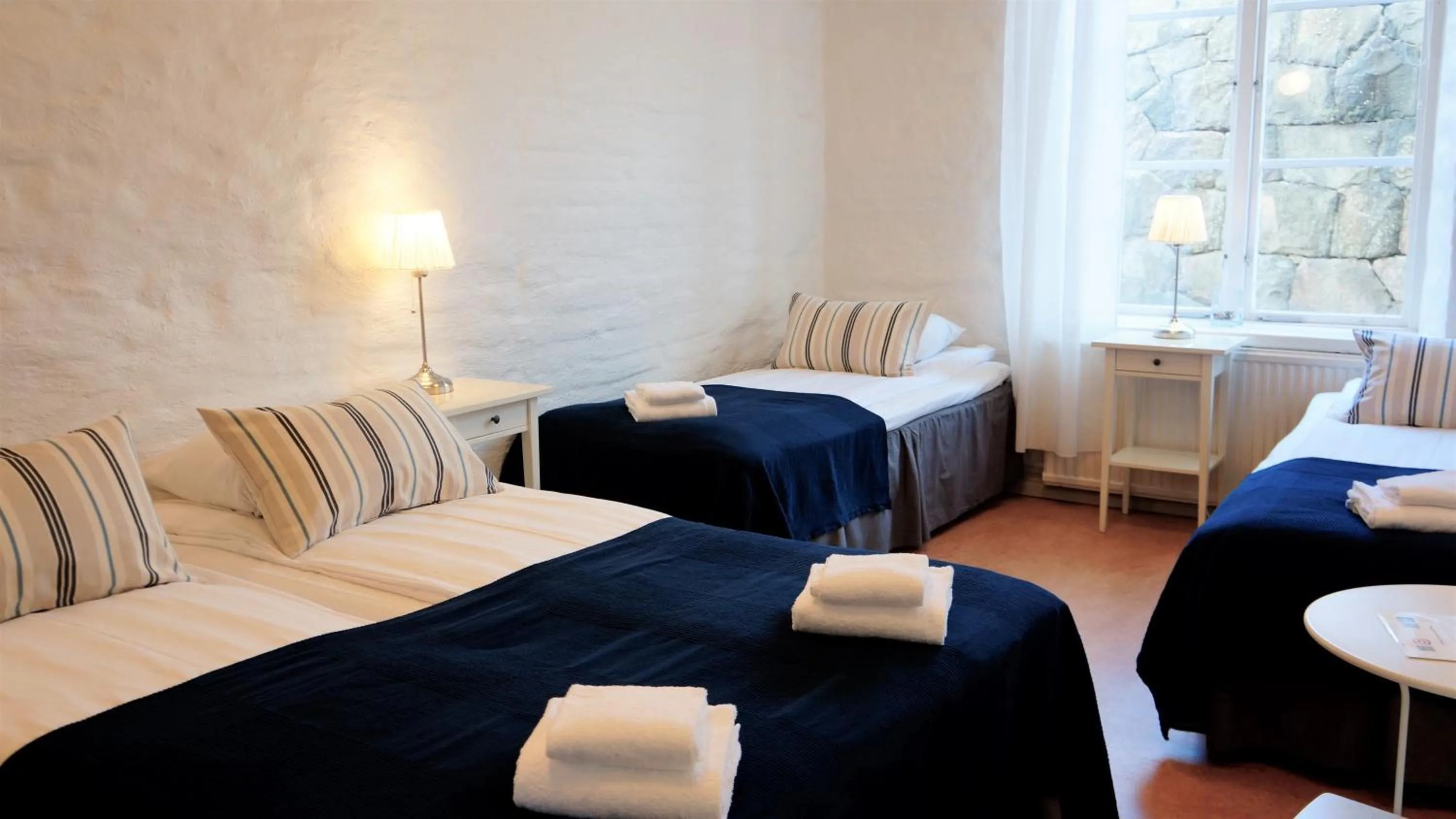 Photo of the whole room, Bed in Fästningens