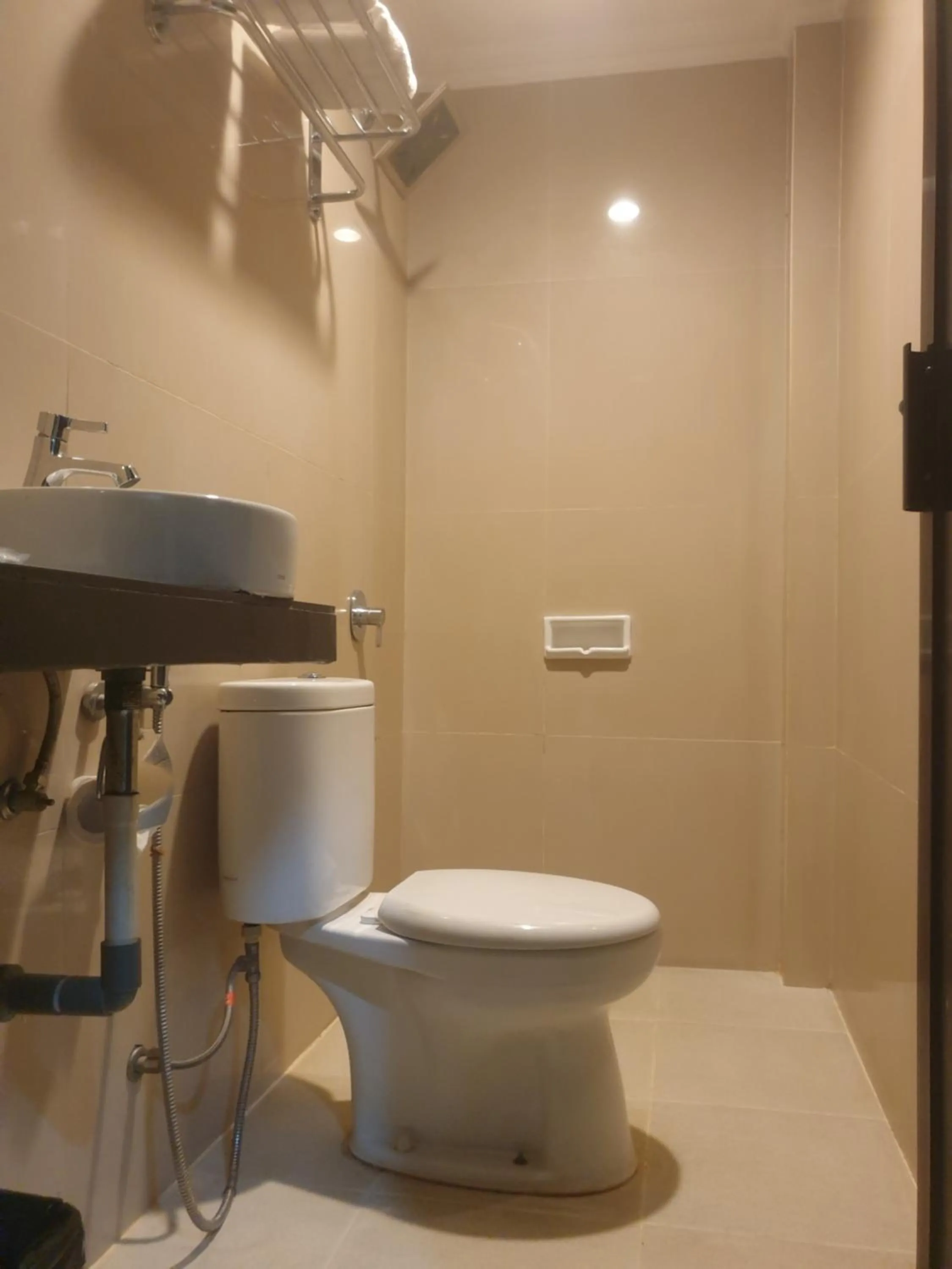 Bathroom in Violand Garden Hotel Samarinda