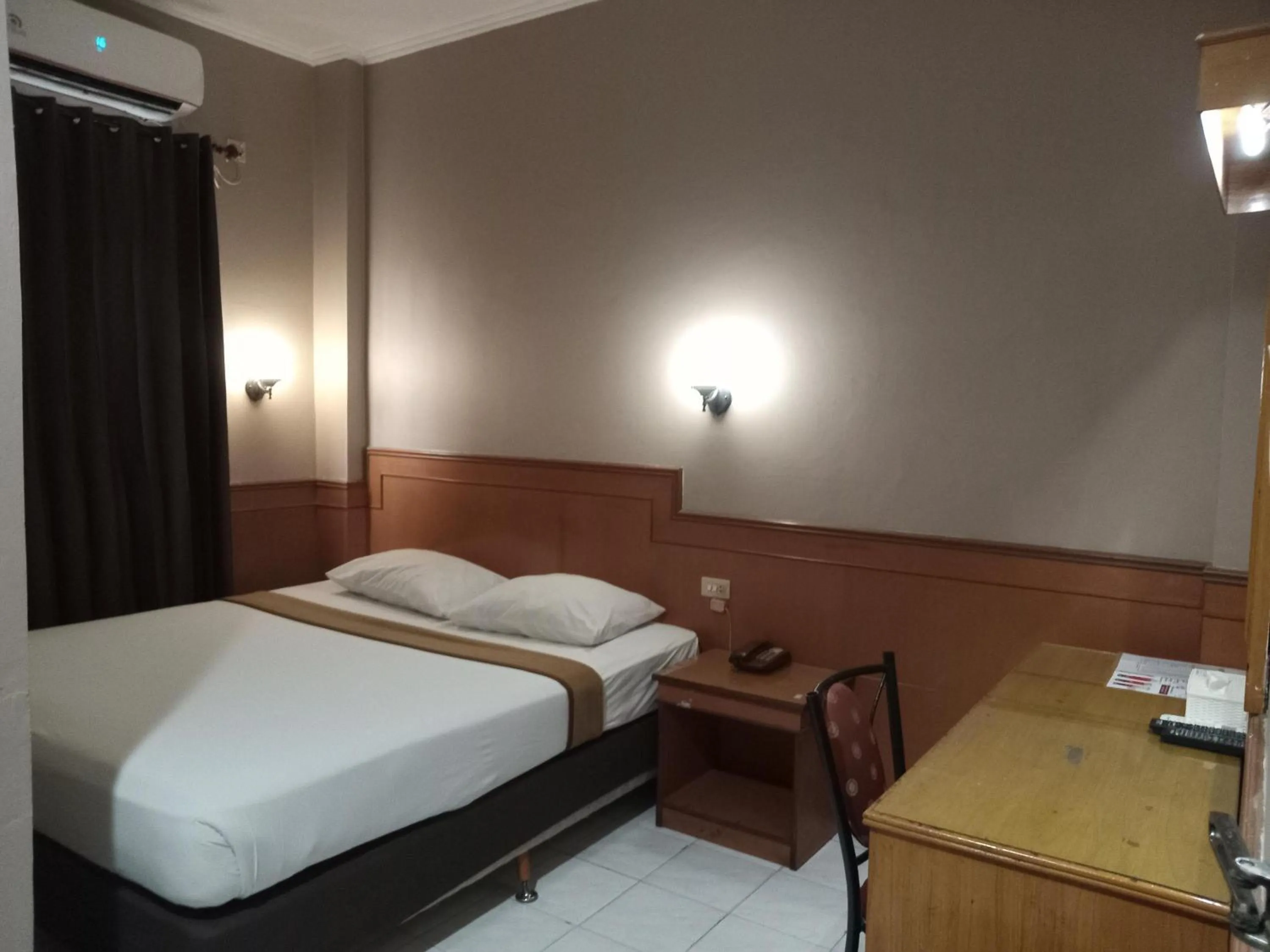 Bed in Violand Garden Hotel Samarinda