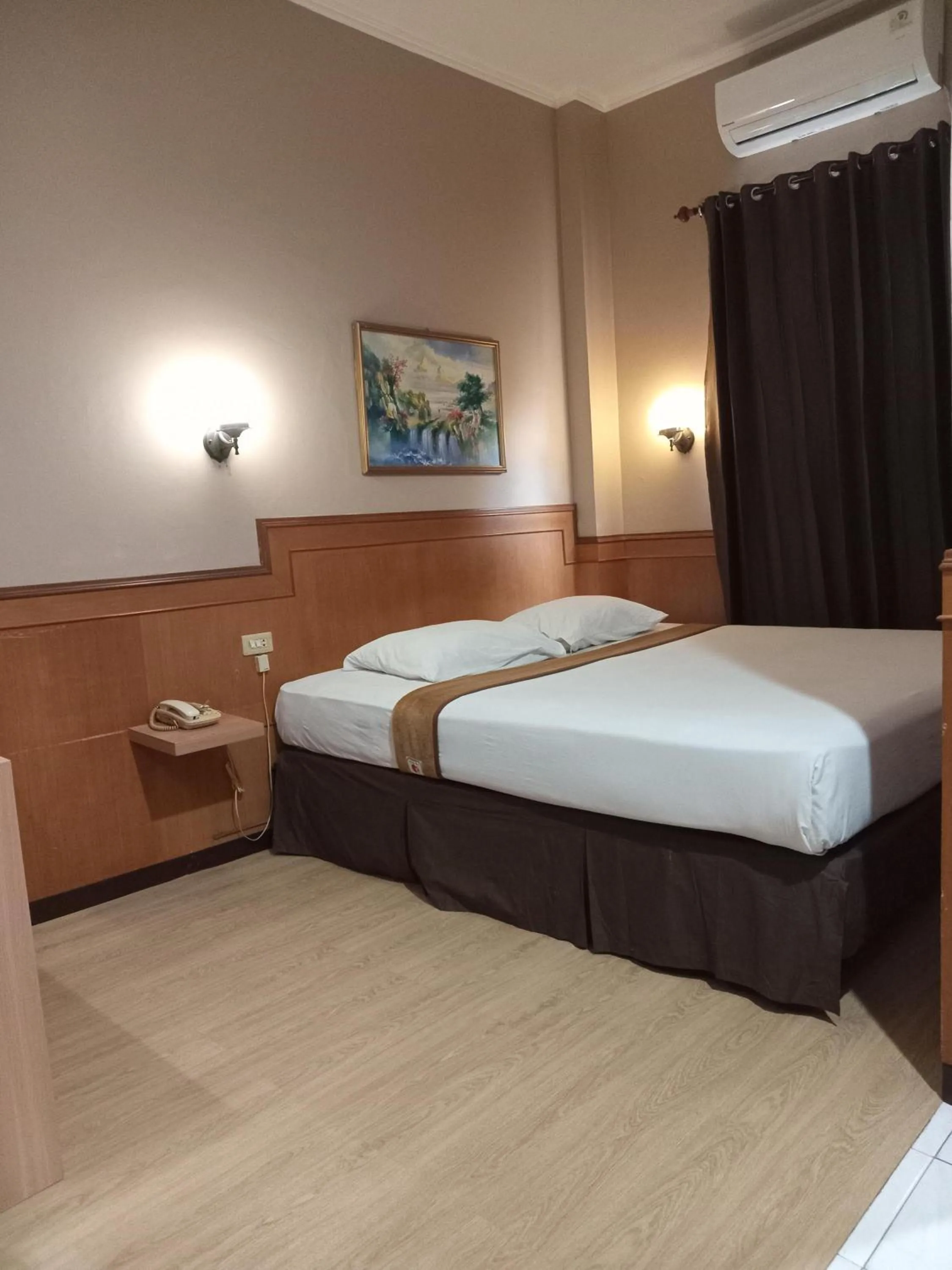 Bed in Violand Garden Hotel Samarinda