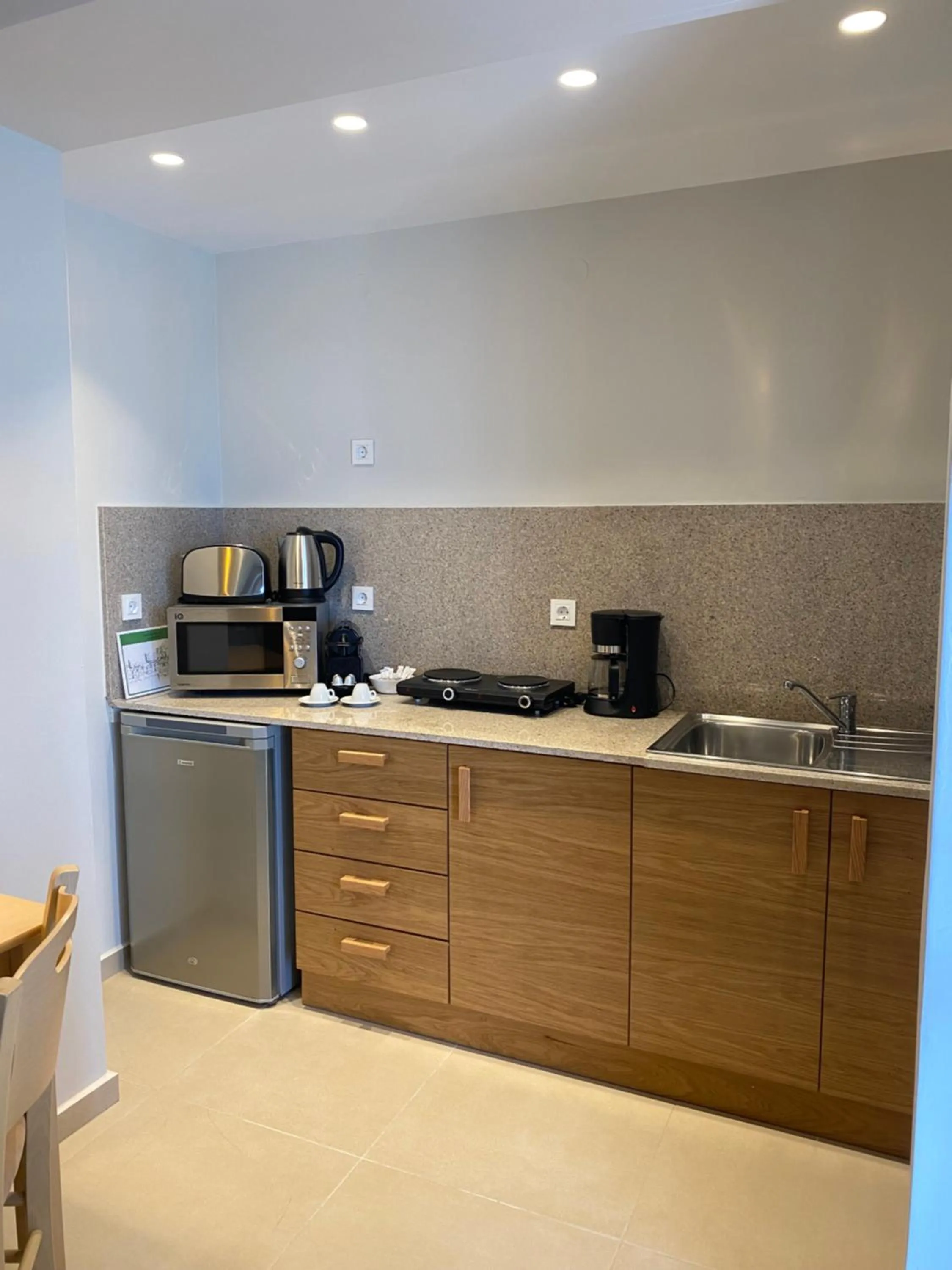 Kitchen or kitchenette in Elena Village Hotel & Suites