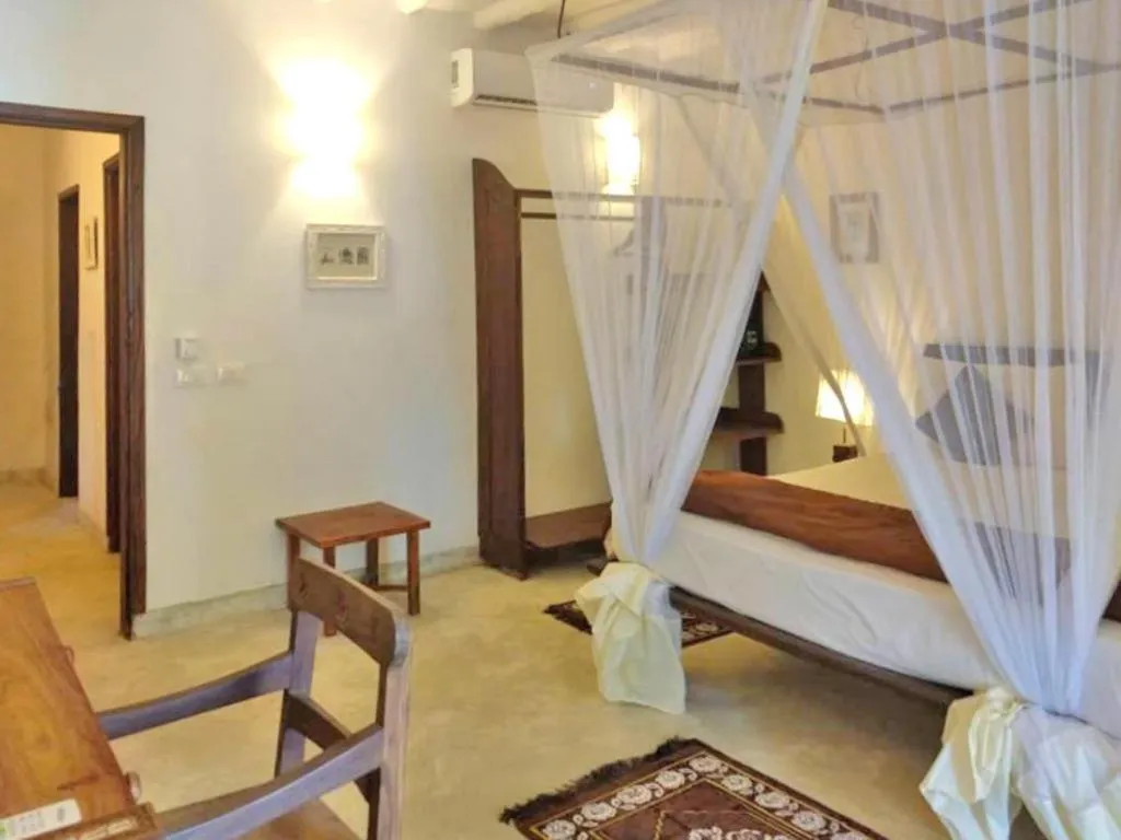 Bed in Pongwe Bay Resort