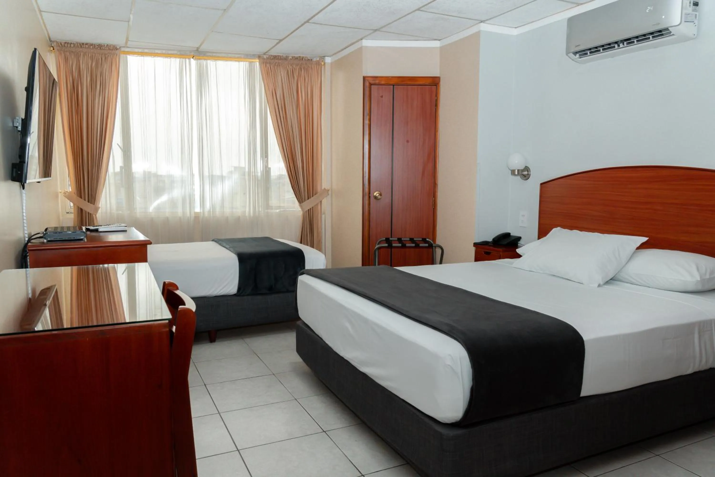 Bed in Grand Hotel Machala