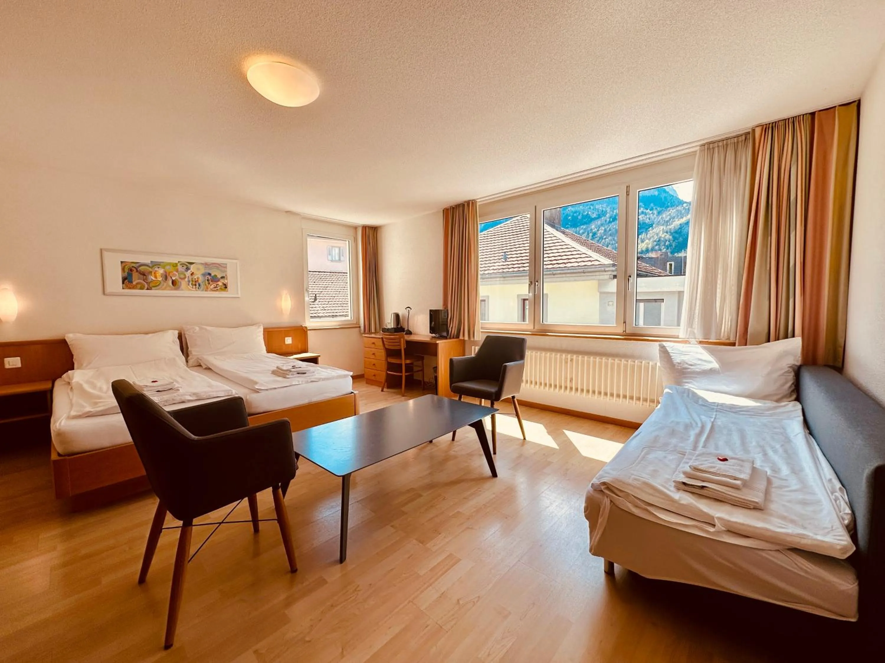 Bed in Hotel Rebstock Meiringen