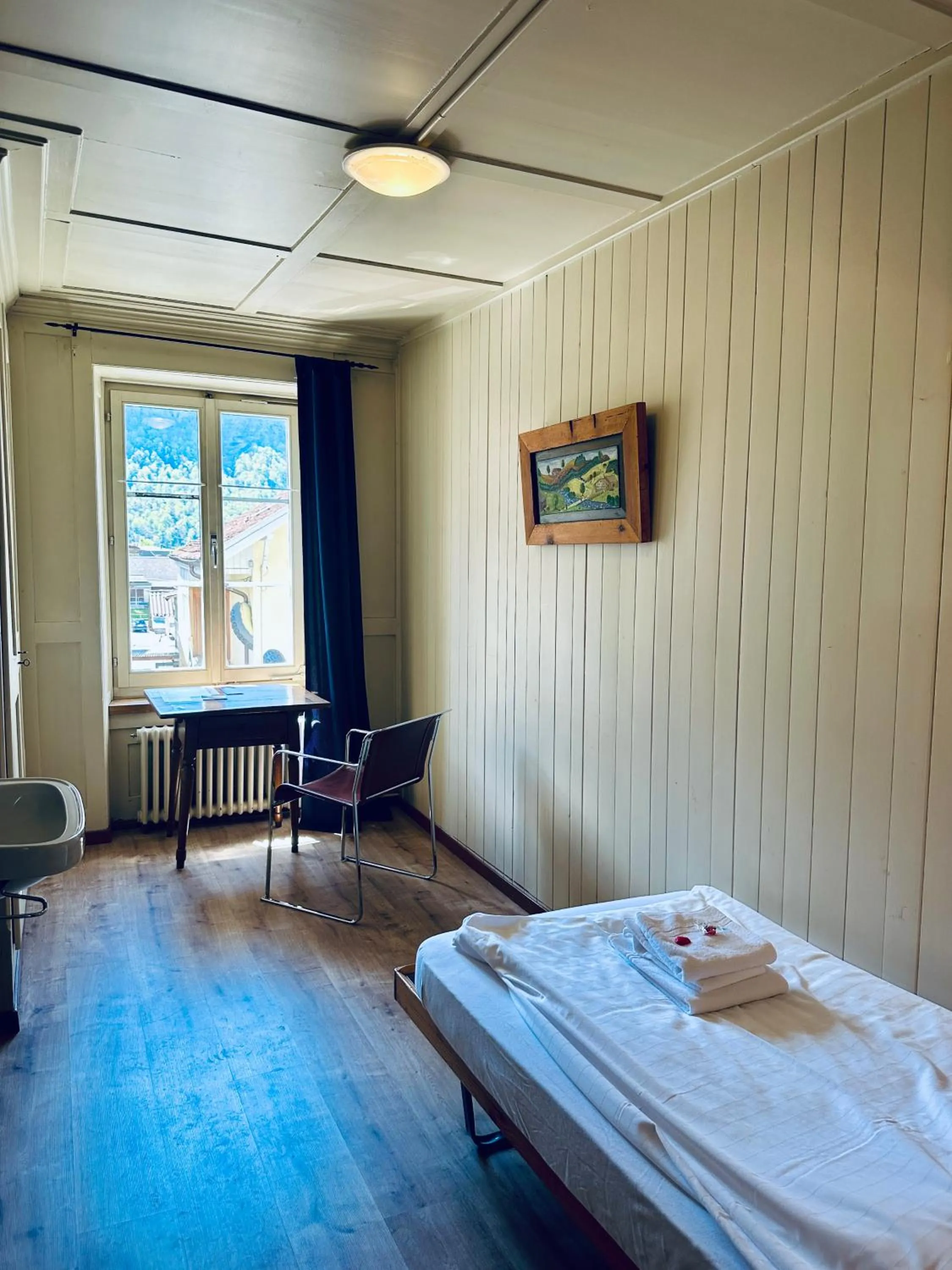 Bed in Hotel Rebstock Meiringen