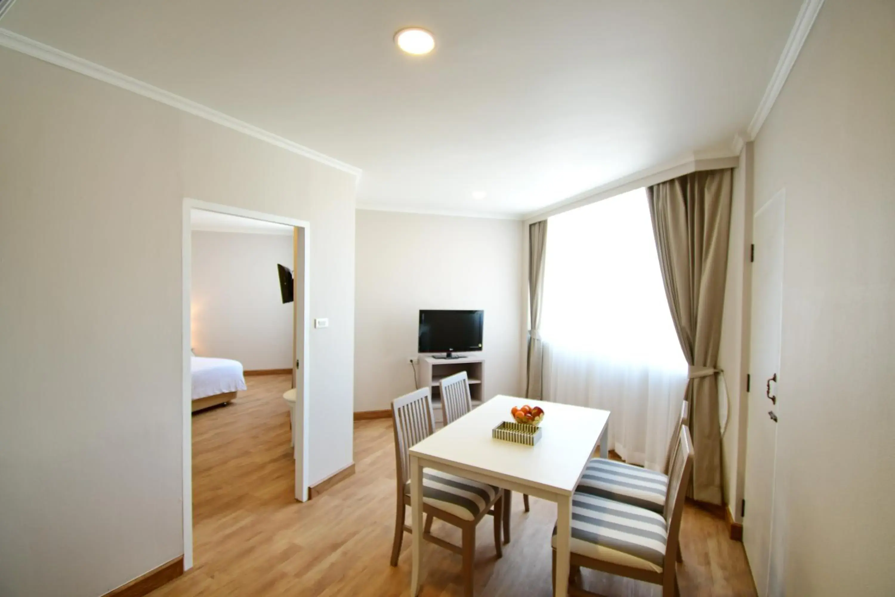 Seating area, Bed in Wangcome Hotel Seating area, Bed in Wangcome Hotel