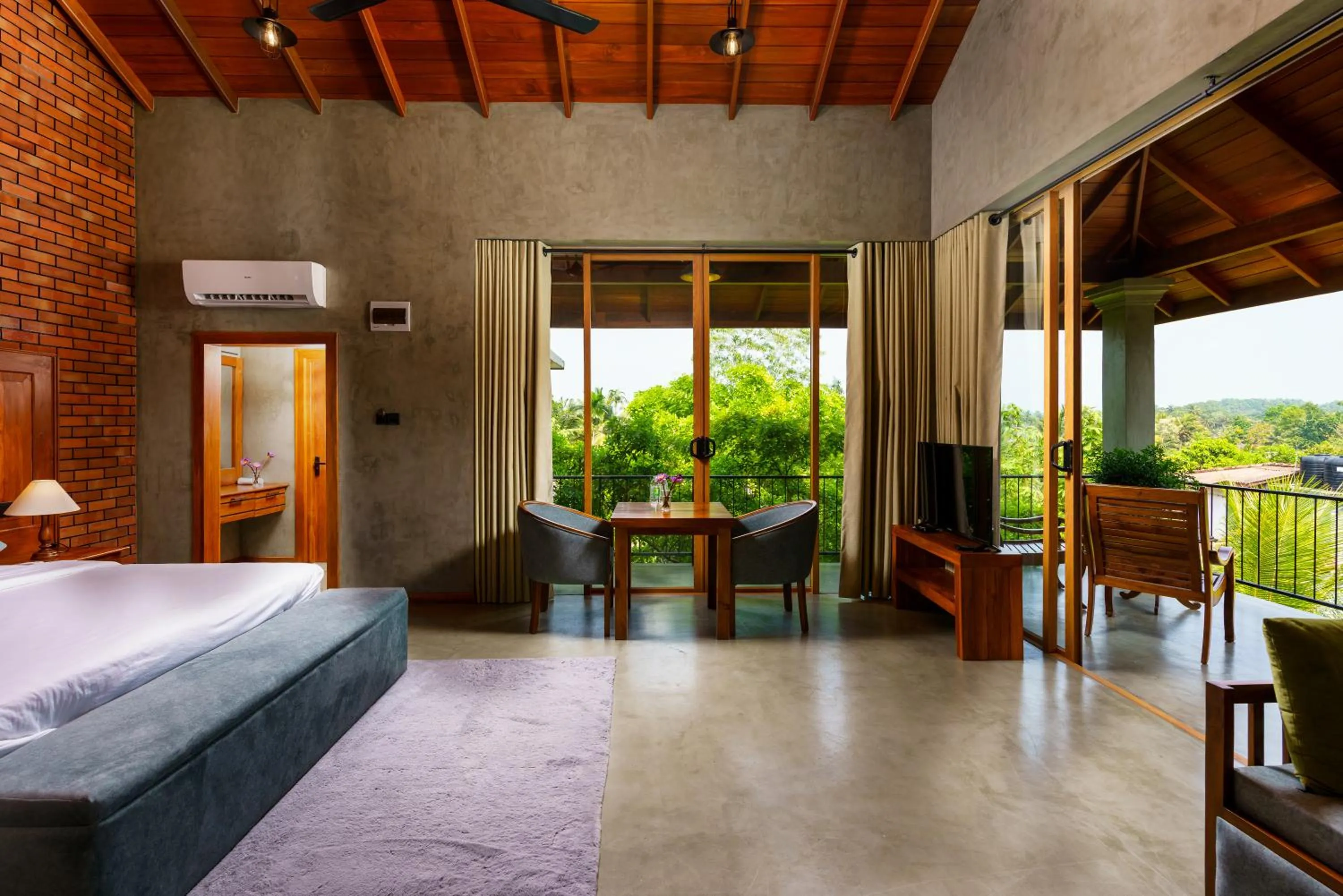 Bed in Villa Rumassala Luxury Chalets Unawatuna