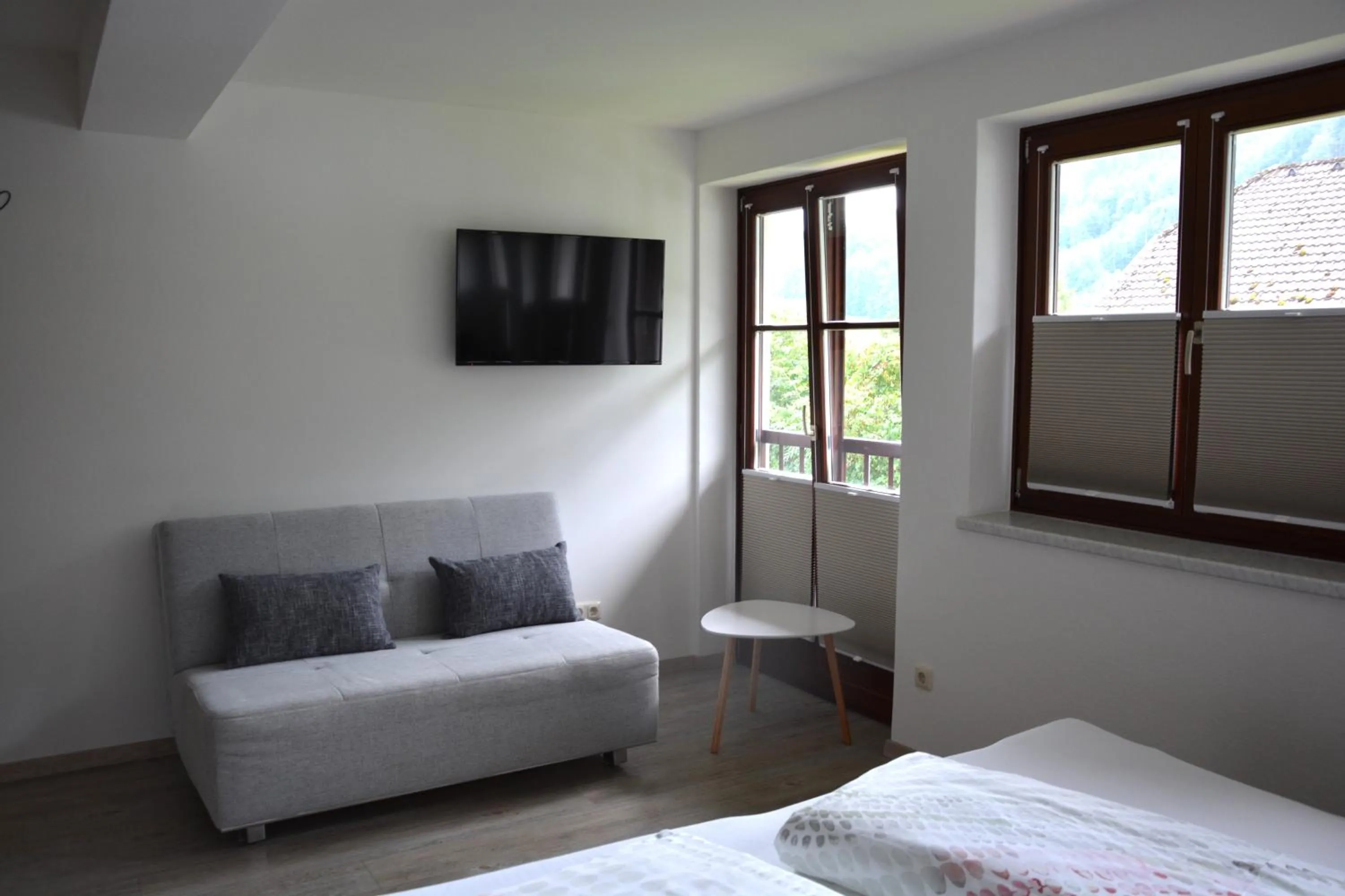 TV and multimedia, Bed in Appart Weisse Urlauben am Wolfgangsee