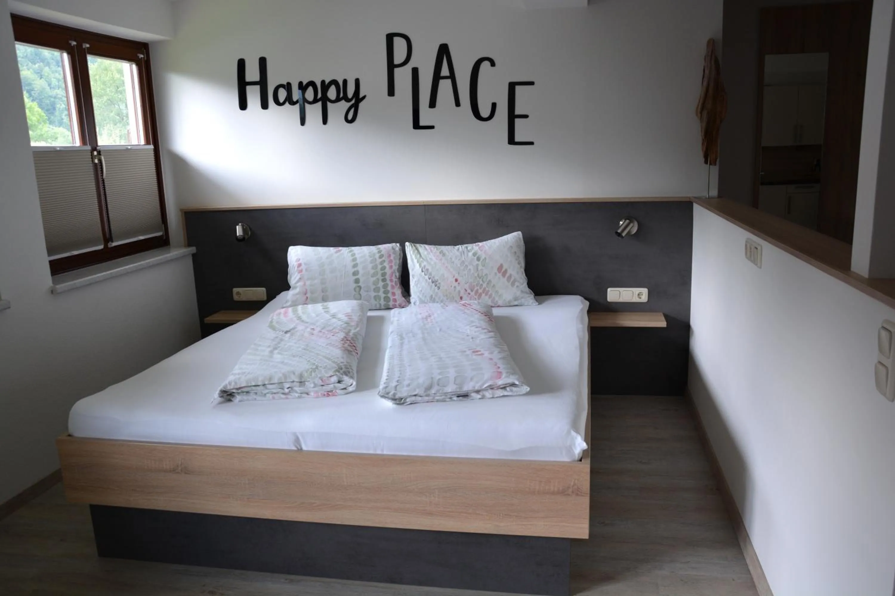 Bed in Appart Weisse Urlauben am Wolfgangsee