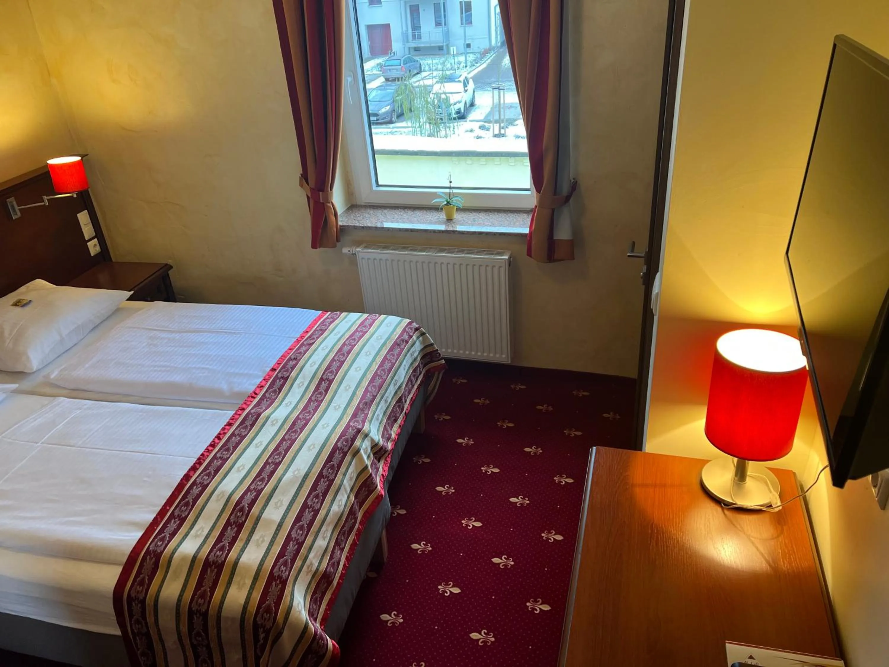 Bed in Hotel Medaillon