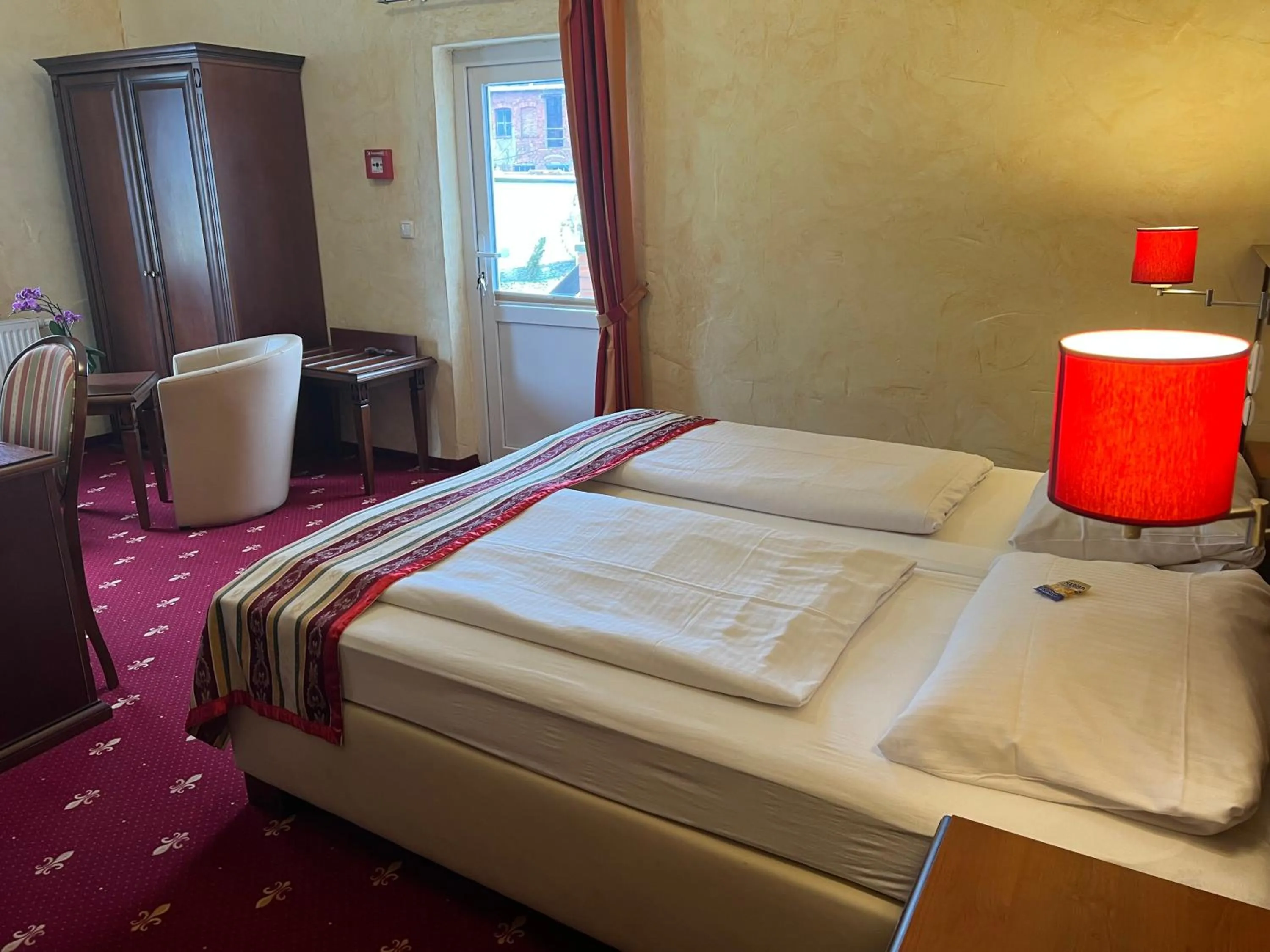 Bed in Hotel Medaillon