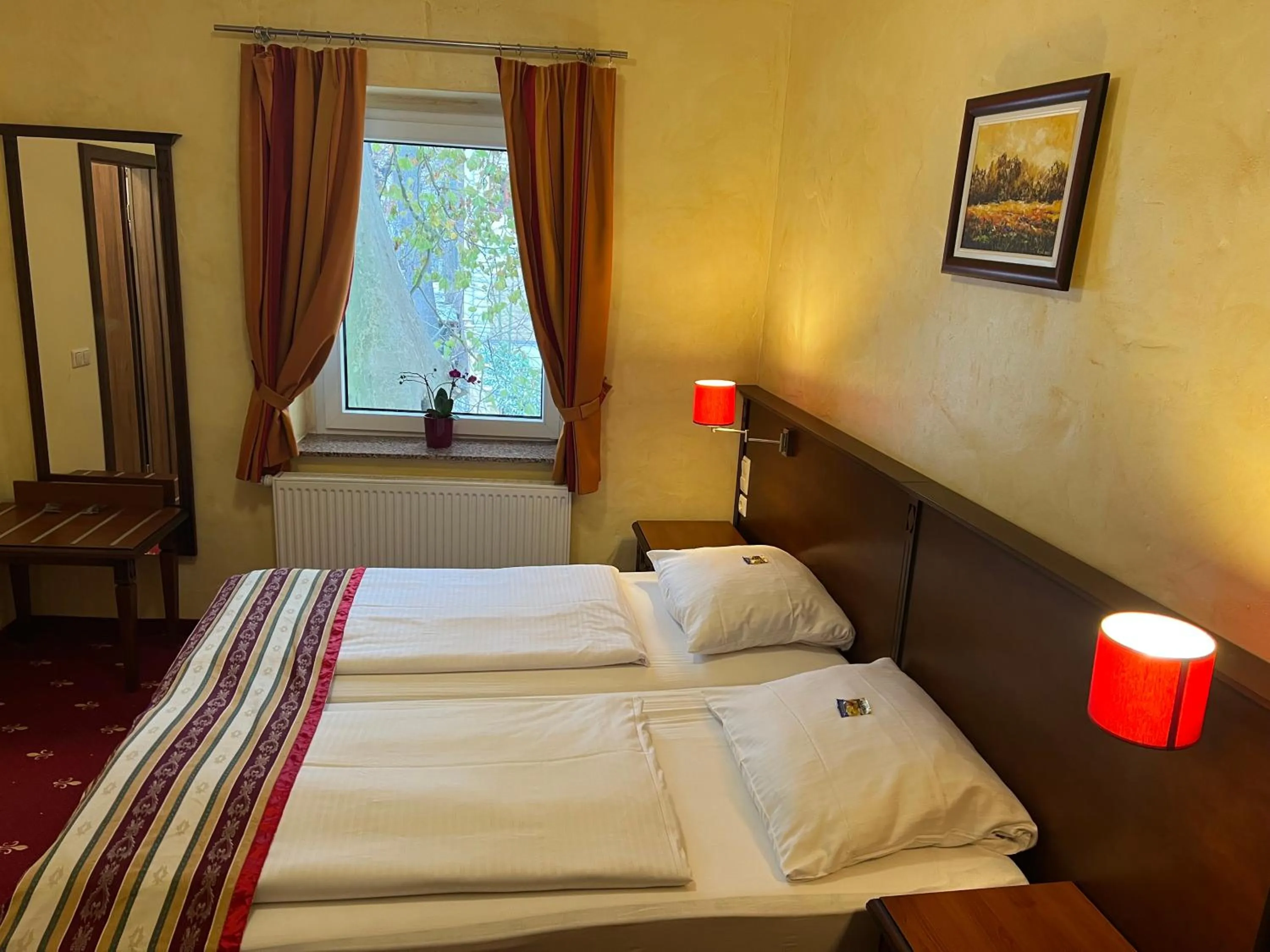 Bed in Hotel Medaillon