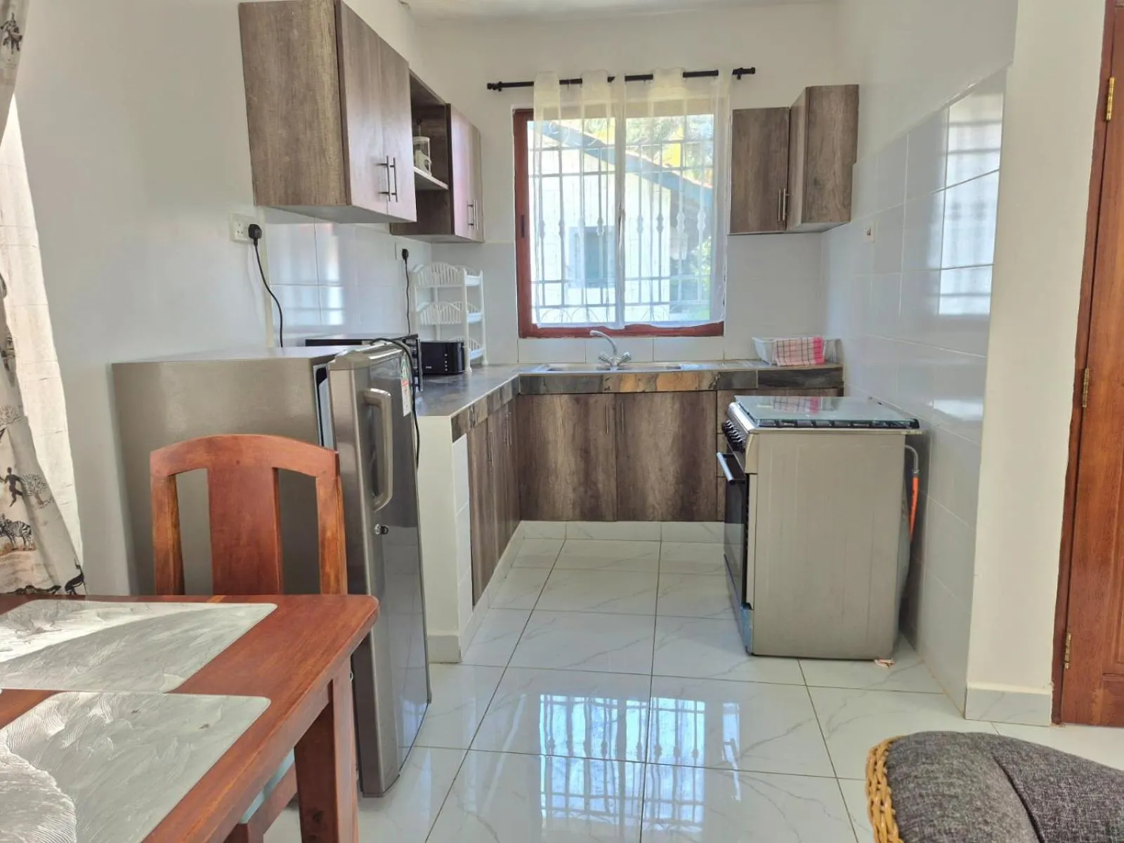 Kitchen or kitchenette in African Dream Cottages - Diani Beach