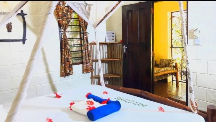 Bed in African Dream Cottages - Diani Beach