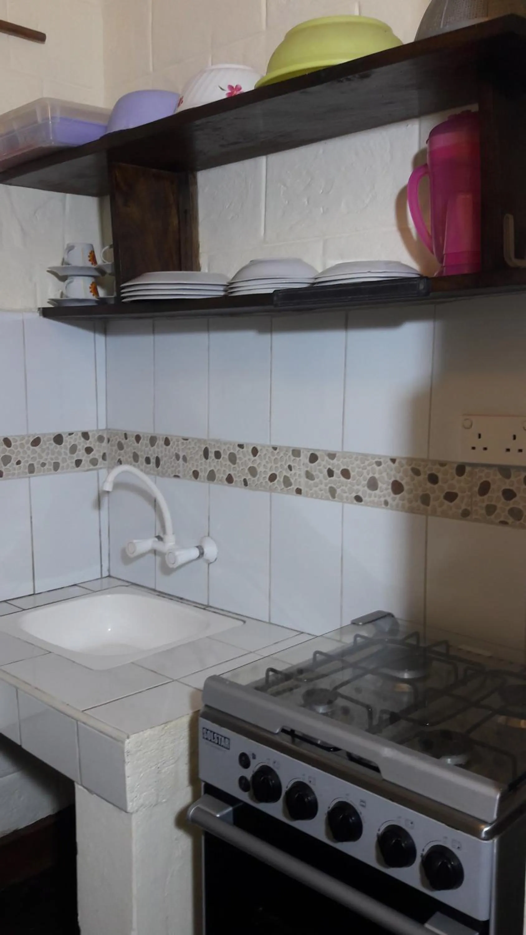 Kitchen or kitchenette in African Dream Cottages - Diani Beach