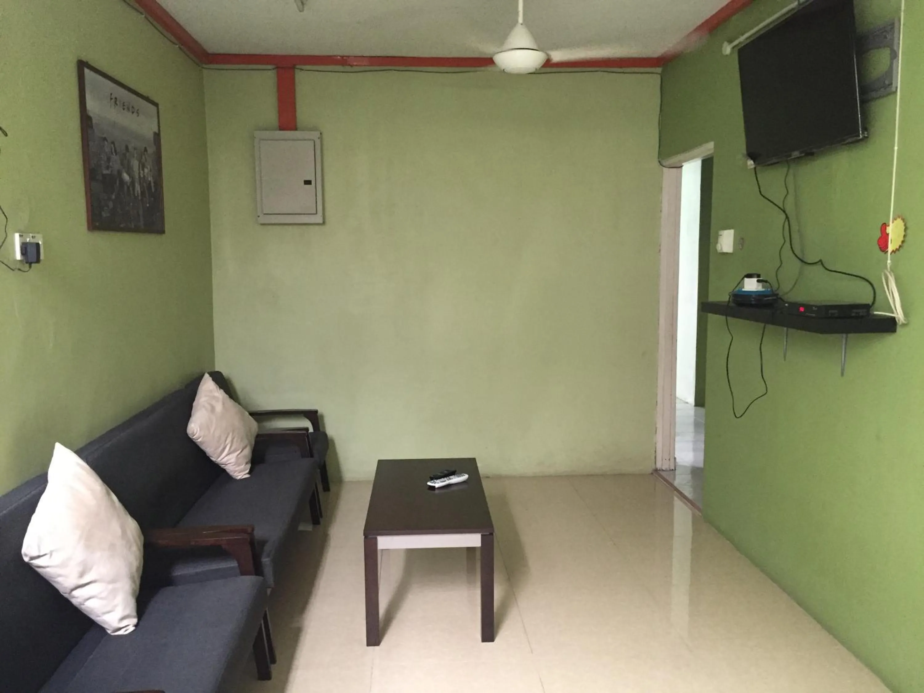 Communal lounge/ TV room in Apple Boutique Homestay