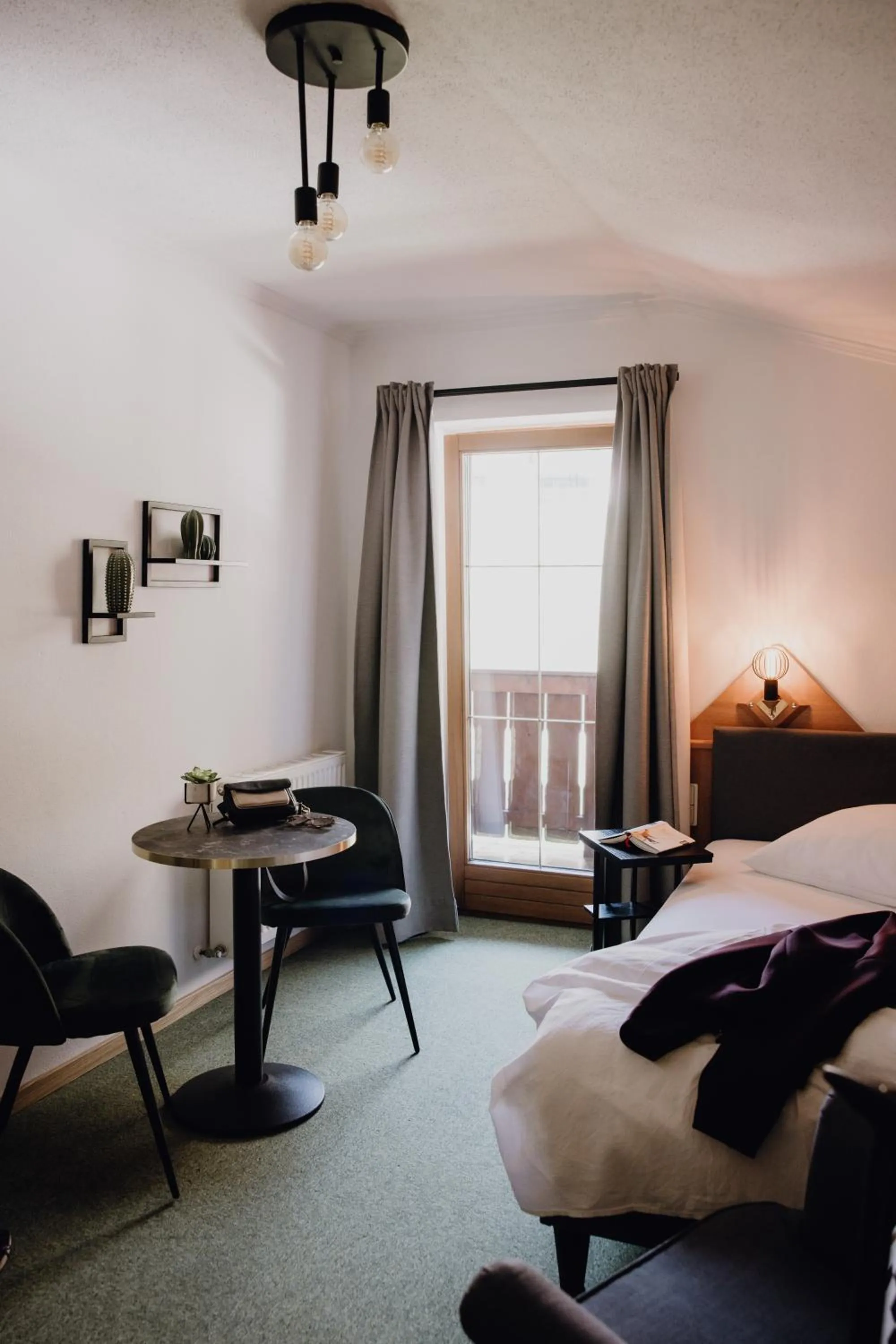 Seating area, Bed in Dorfcafe Unken Hotelpension sWirtshaus im Dorf