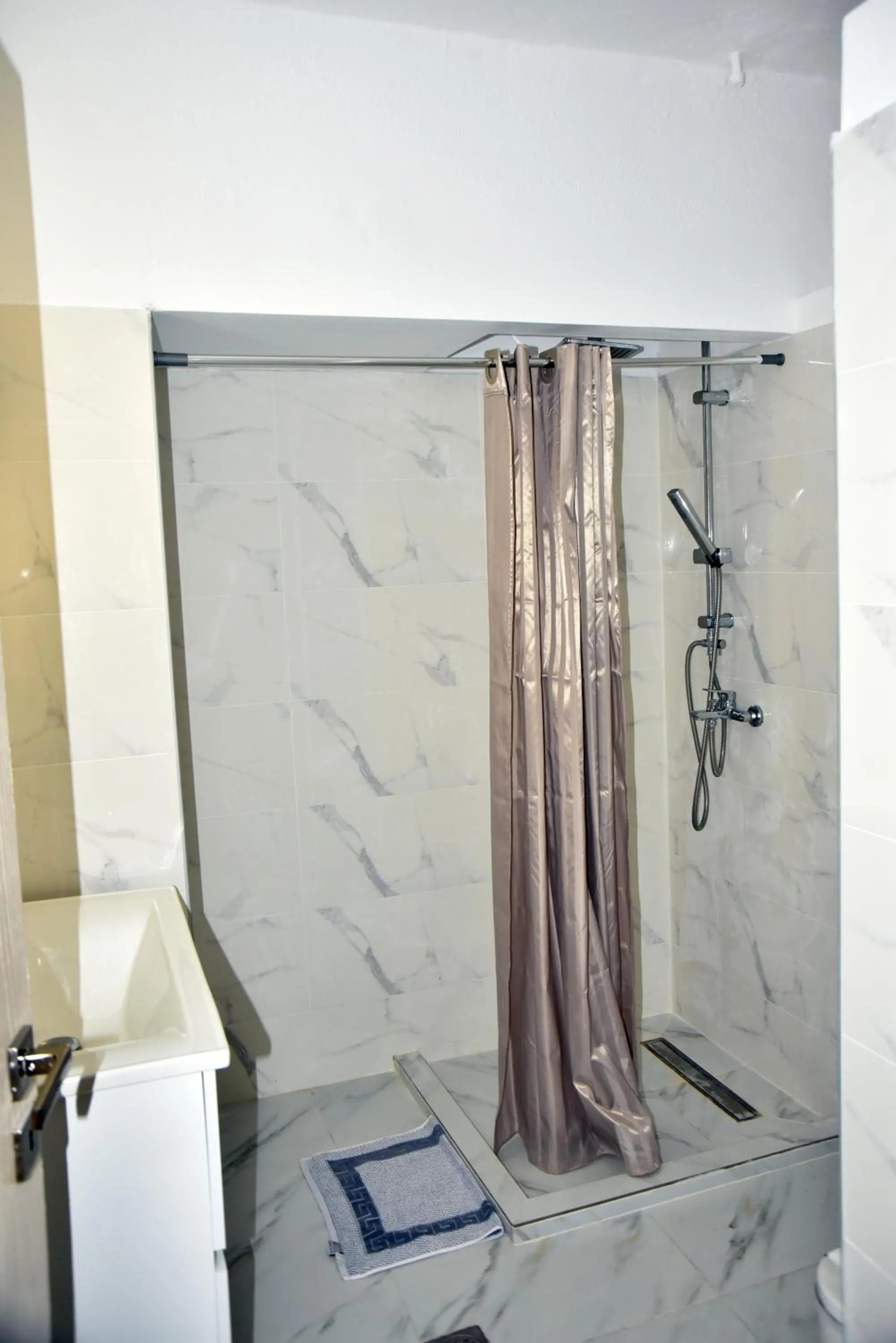 Shower in Jimmy's Apartments