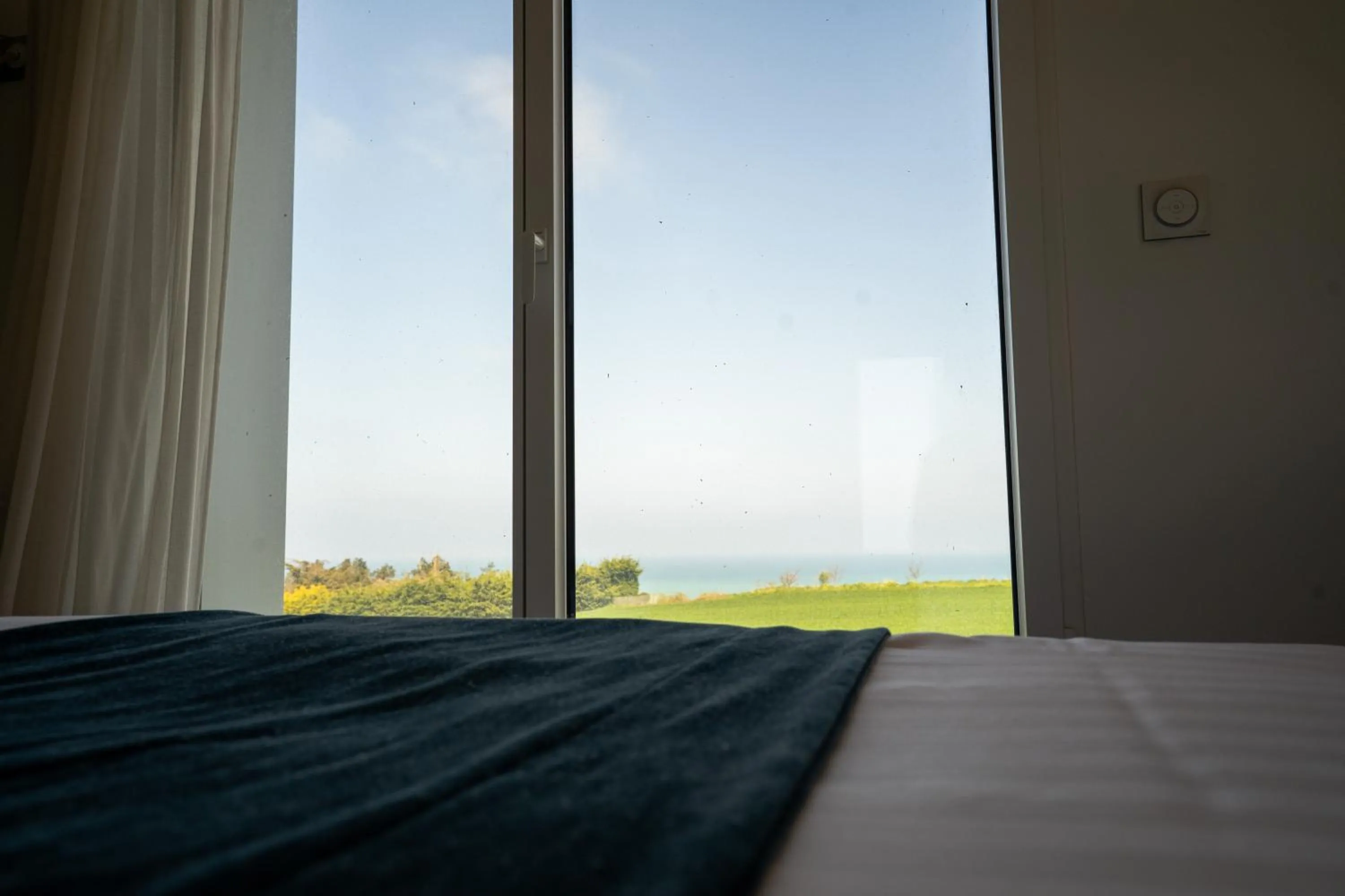 Bed in Hôtel Le Manoir du Roselier