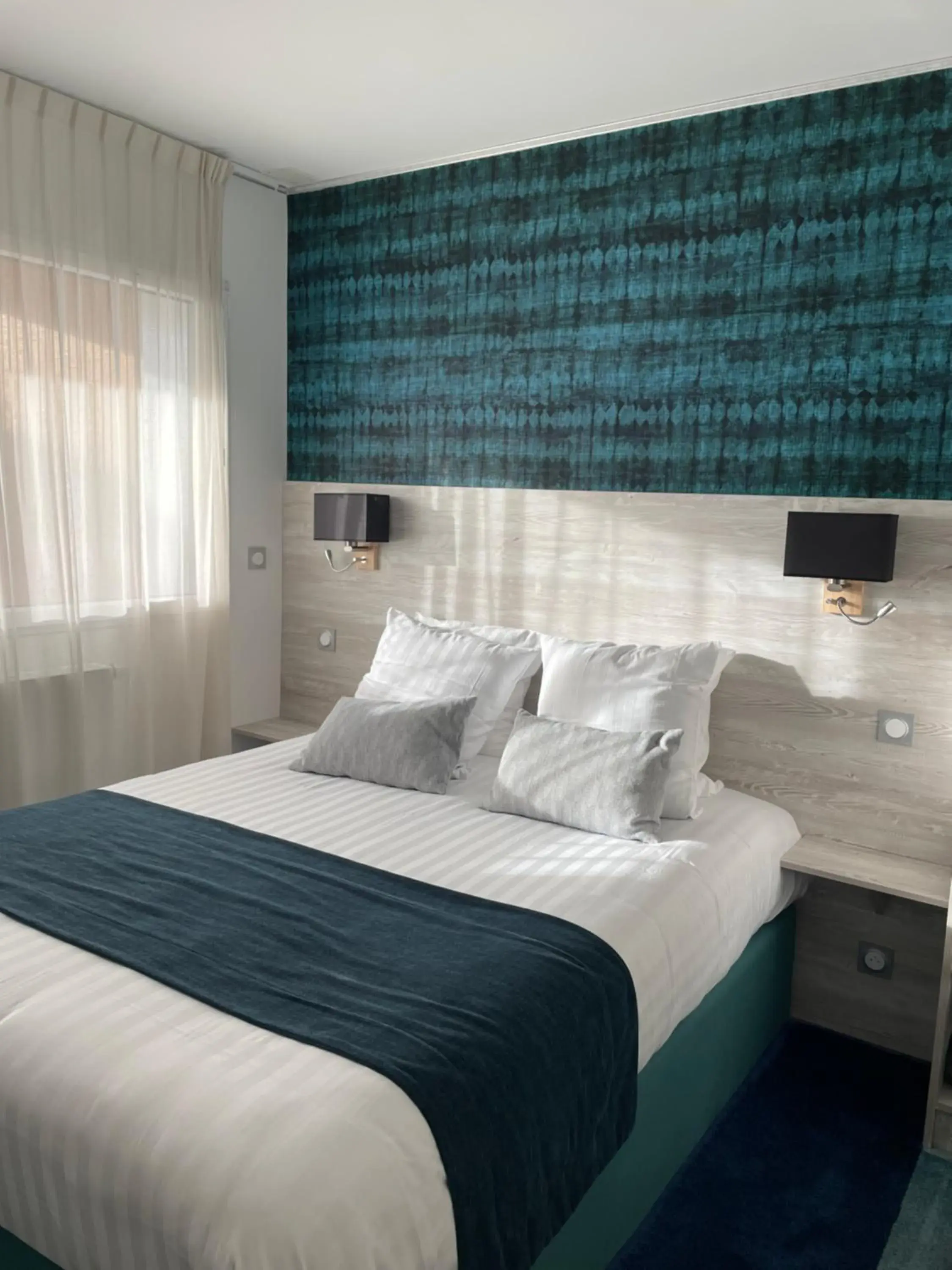 Comfort Room with Sea View in Hôtel Le Manoir du Roselier Comfort Room with Sea View in Hôtel Le Manoir du Roselier