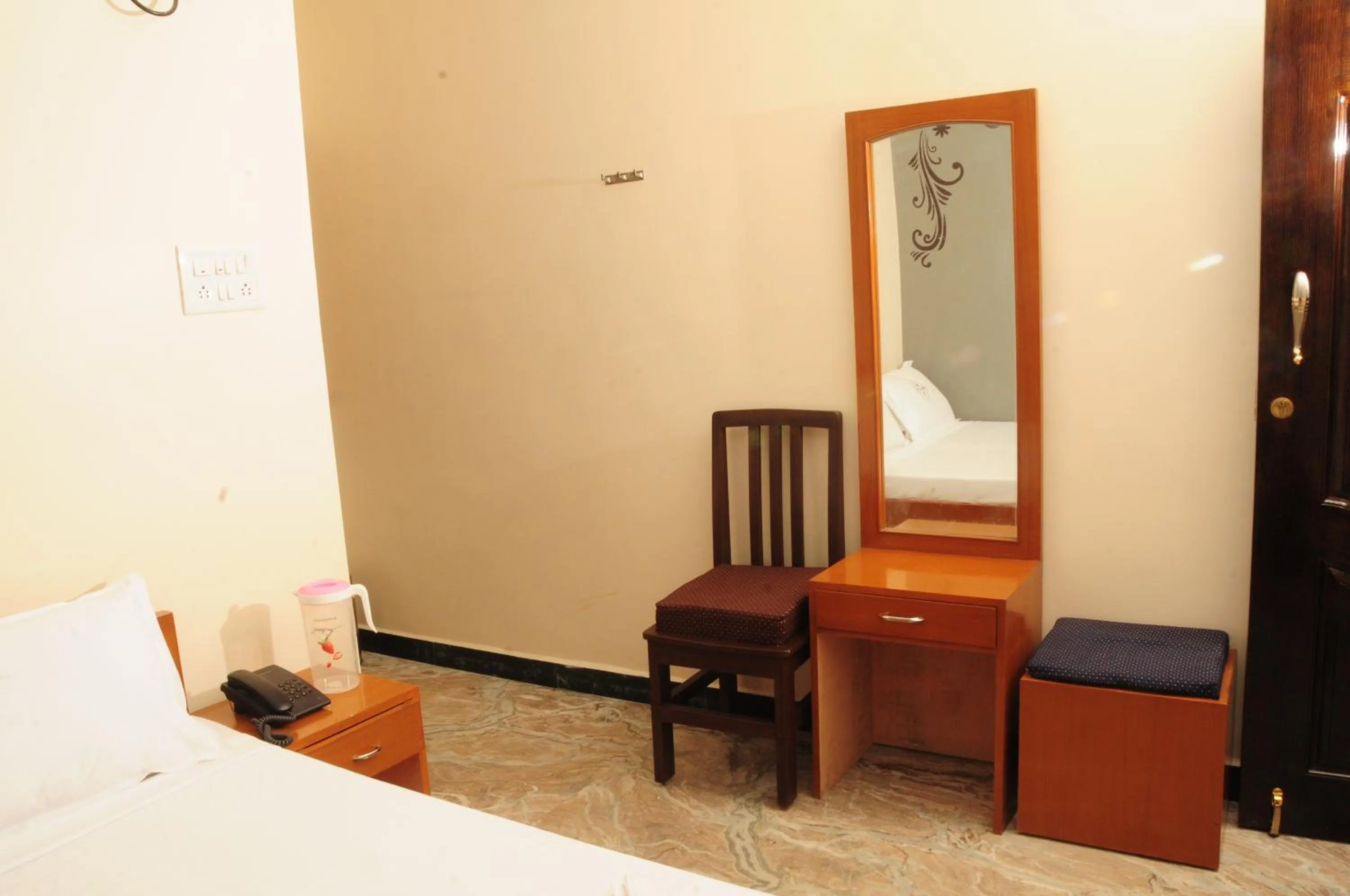 Decorative detail, Bed in Hotel Rathnavel Towers