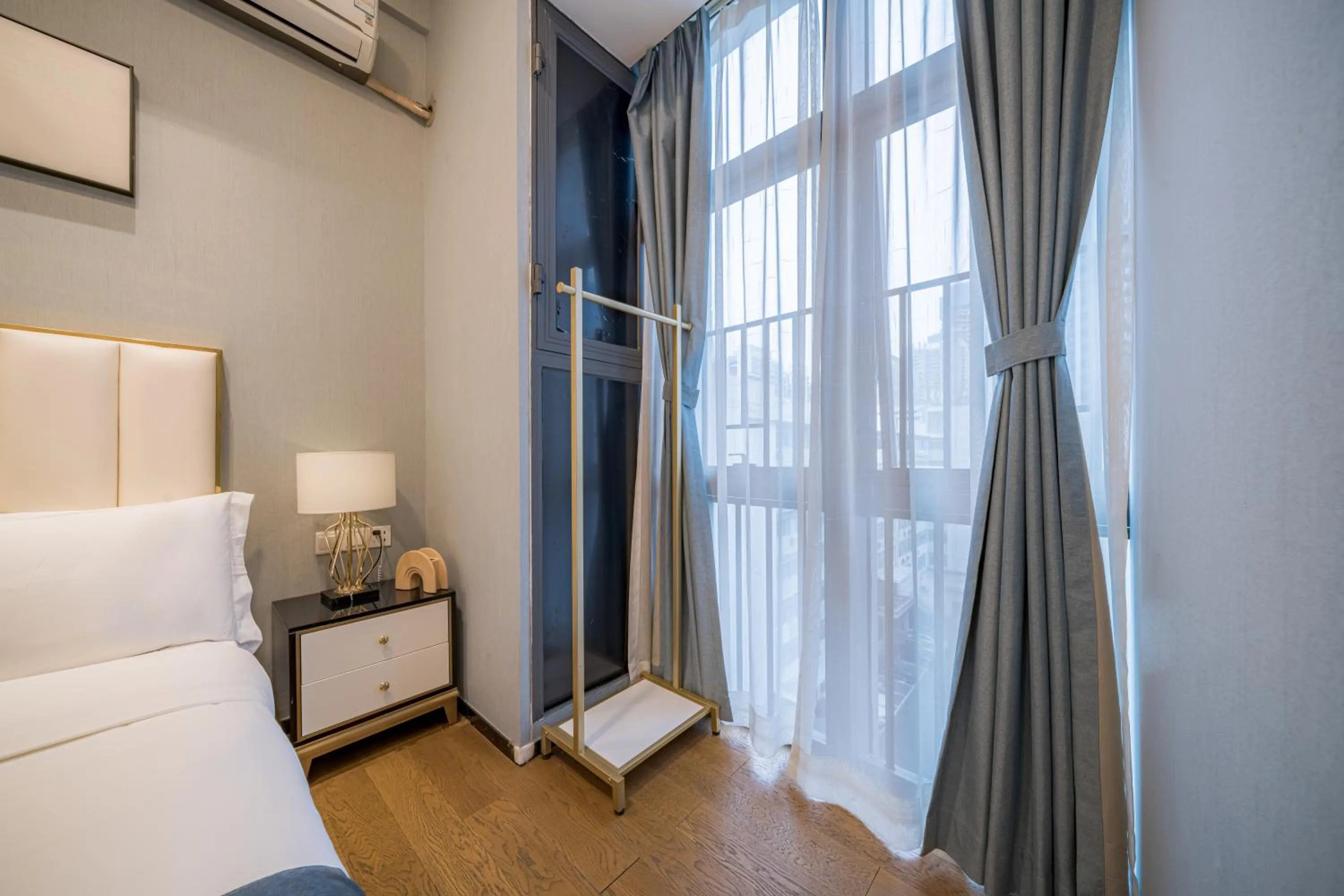 Bedroom, Bed in Gepai Executive Apartment - Shenzhen Futian Convention and Exhibition Center