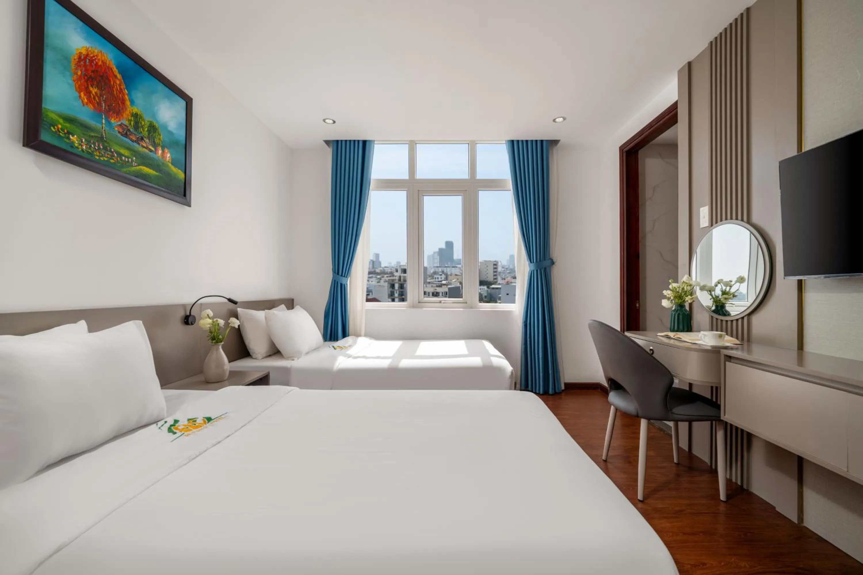 Communal lounge/ TV room, Bed in Fansipan Da Nang Hotel