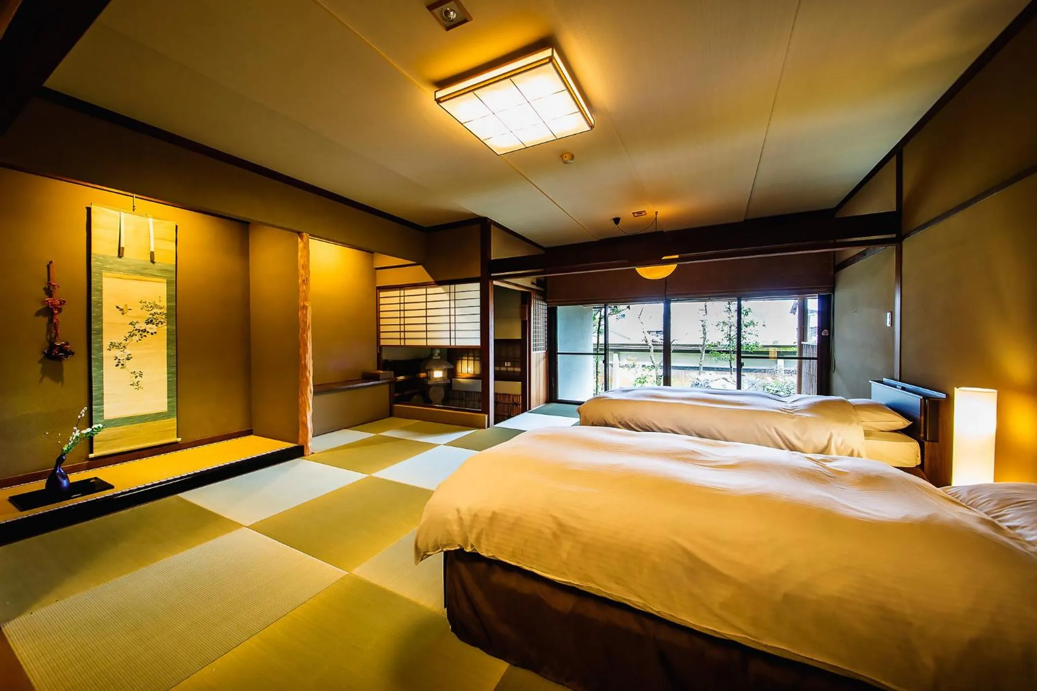 Bed in Ryoutei Ryokan Yasui
