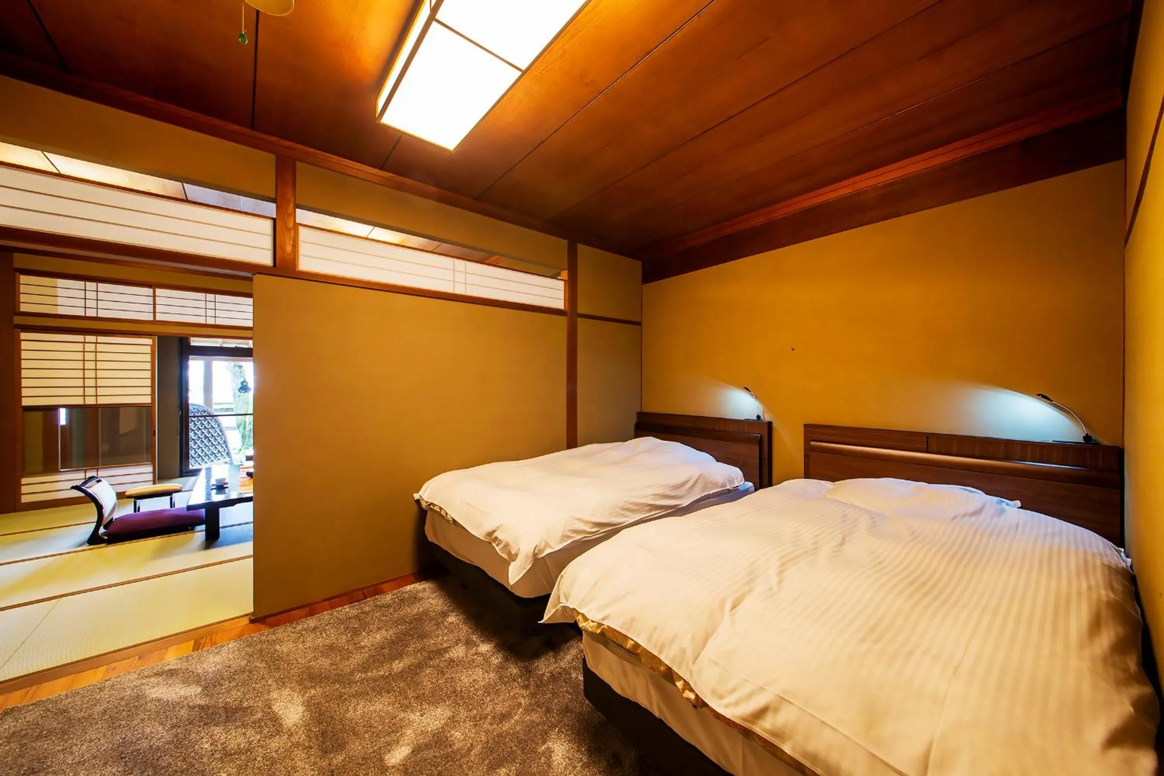 Bed in Ryoutei Ryokan Yasui