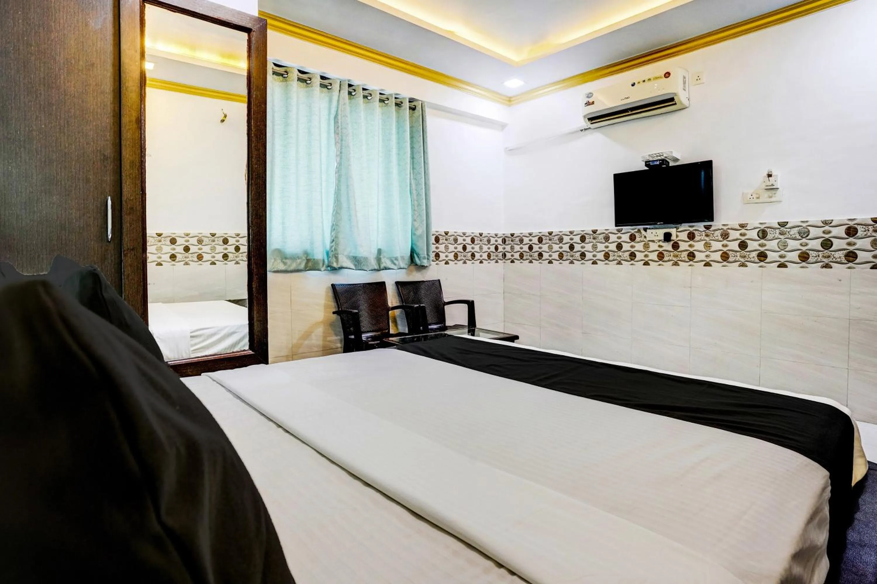 Bedroom, Bed in Hotel O Shree Sai Residency