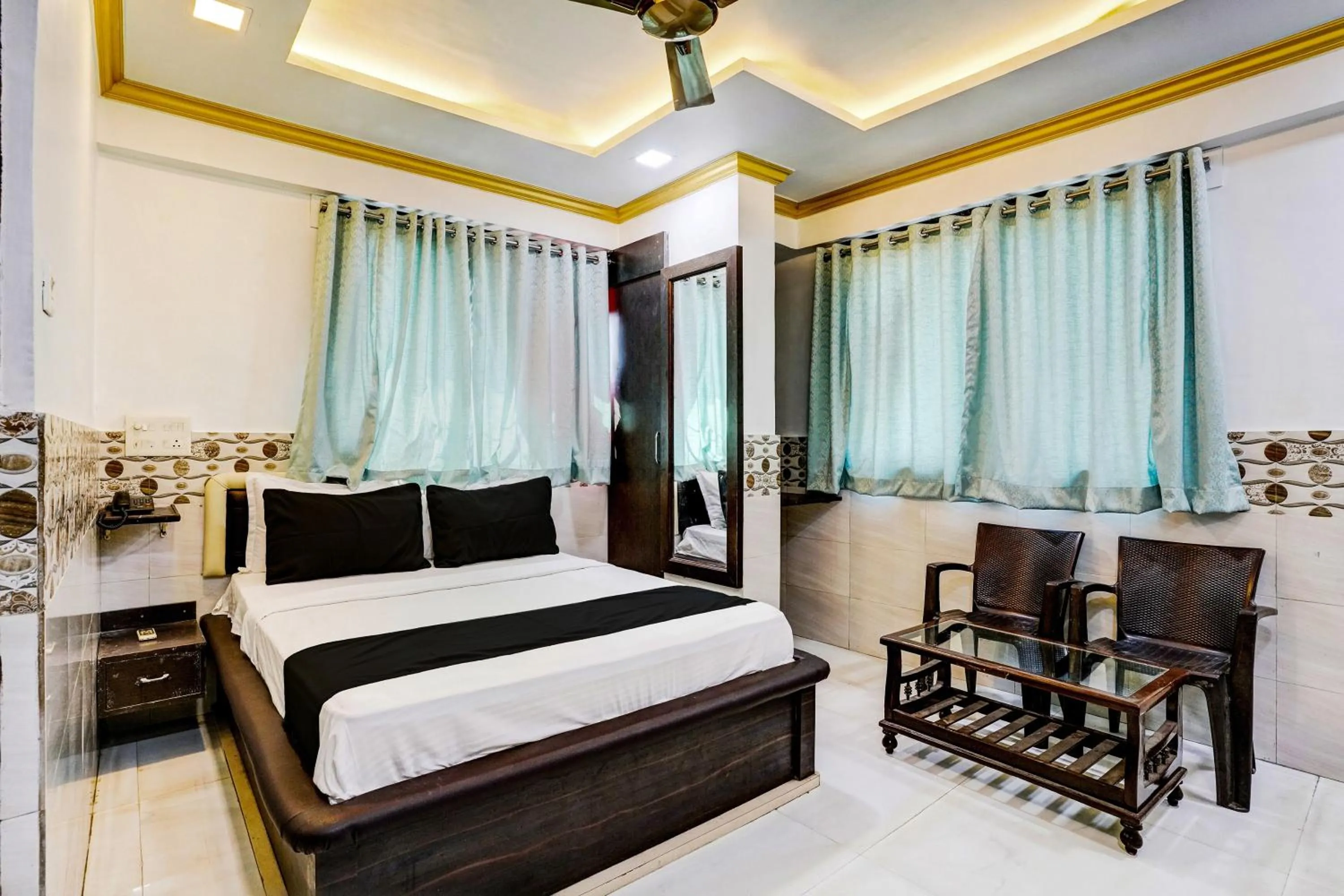 Bedroom, Bed in Hotel O Shree Sai Residency