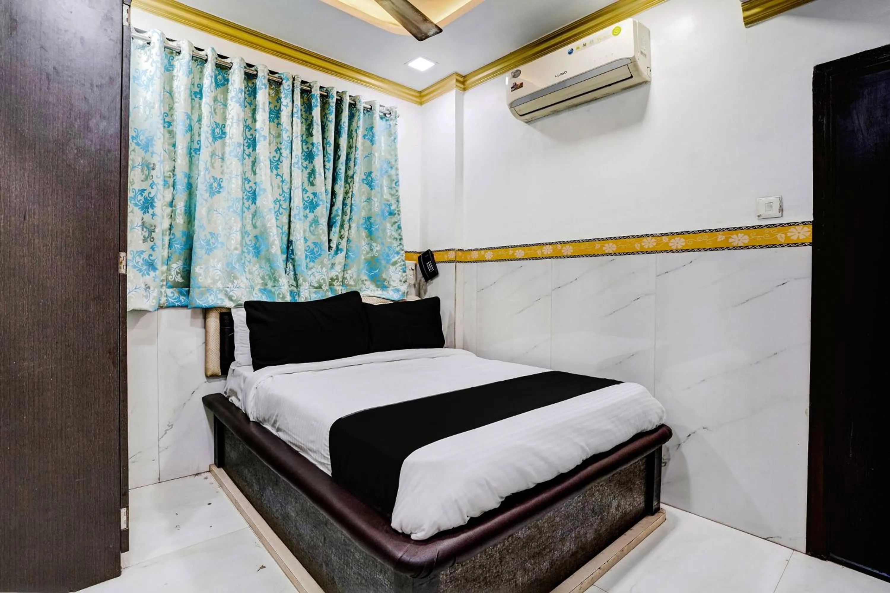 Bedroom, Bed in Hotel O Shree Sai Residency