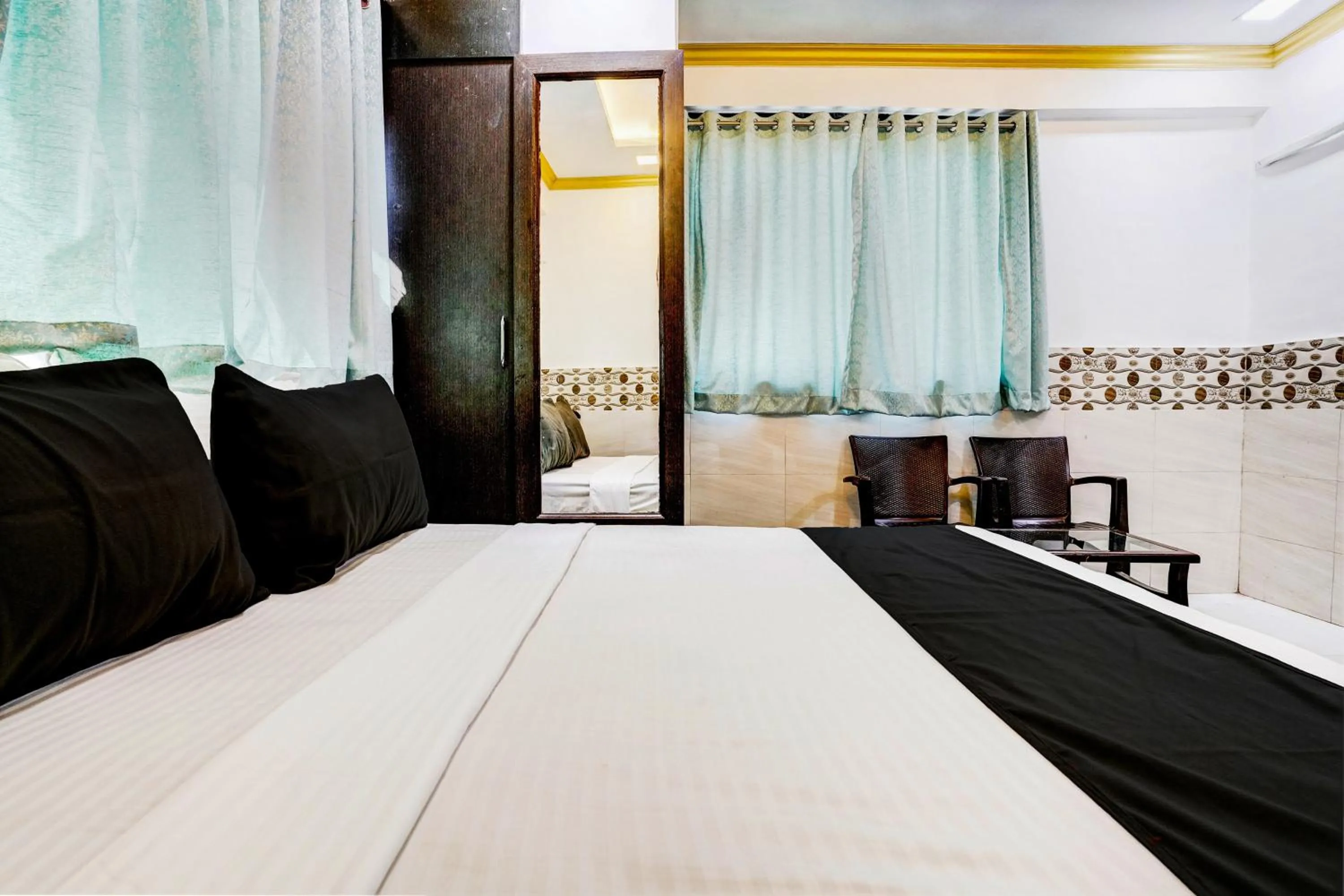 Bedroom, Bed in Hotel O Shree Sai Residency
