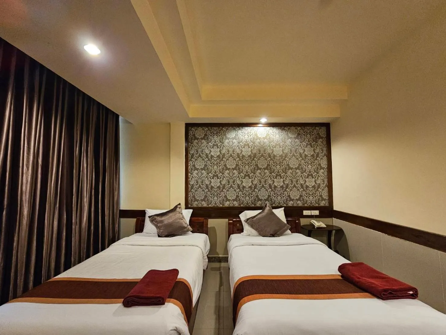 Bed in Boutique Bravo Hotel