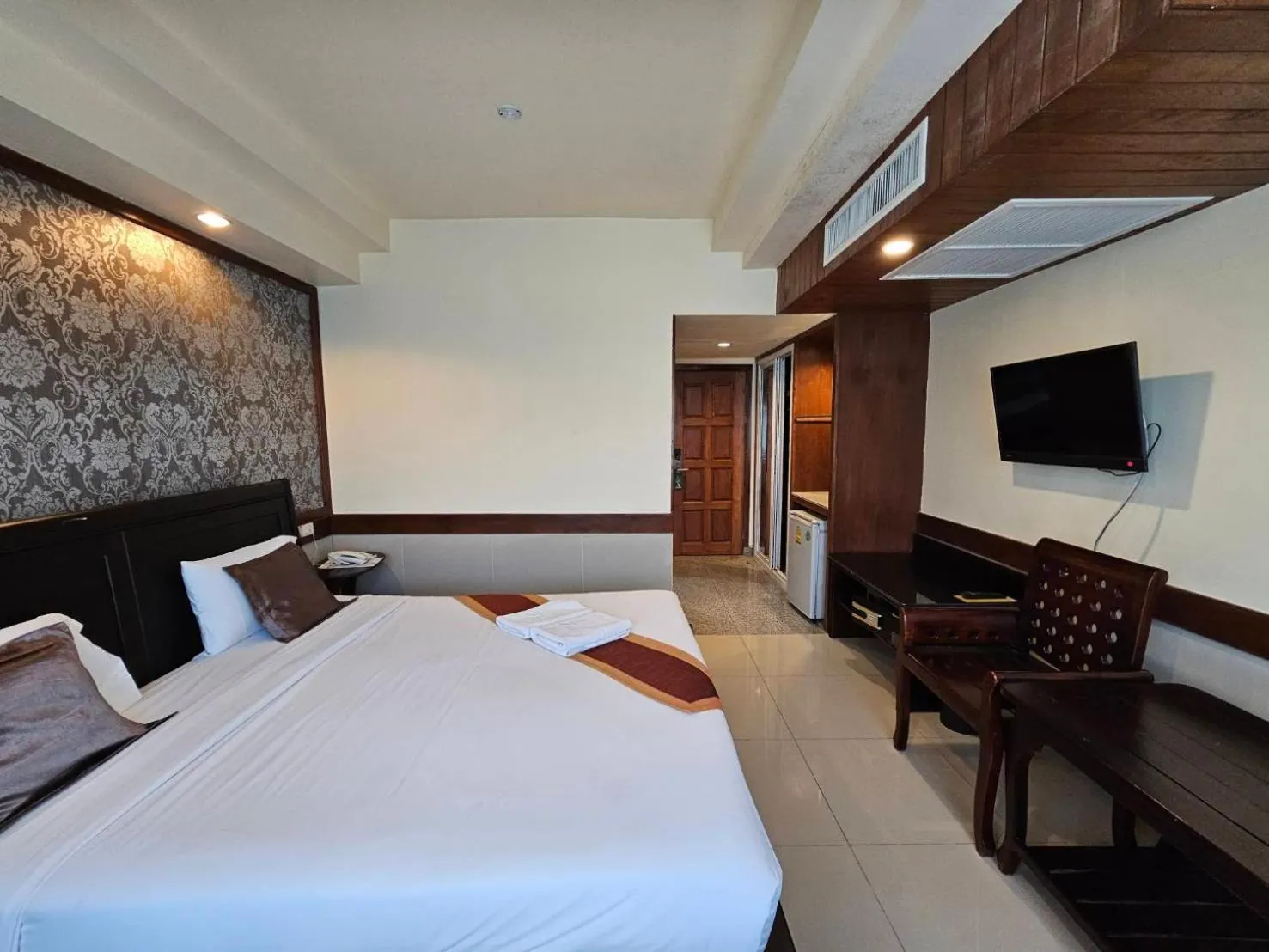 Bed in Boutique Bravo Hotel